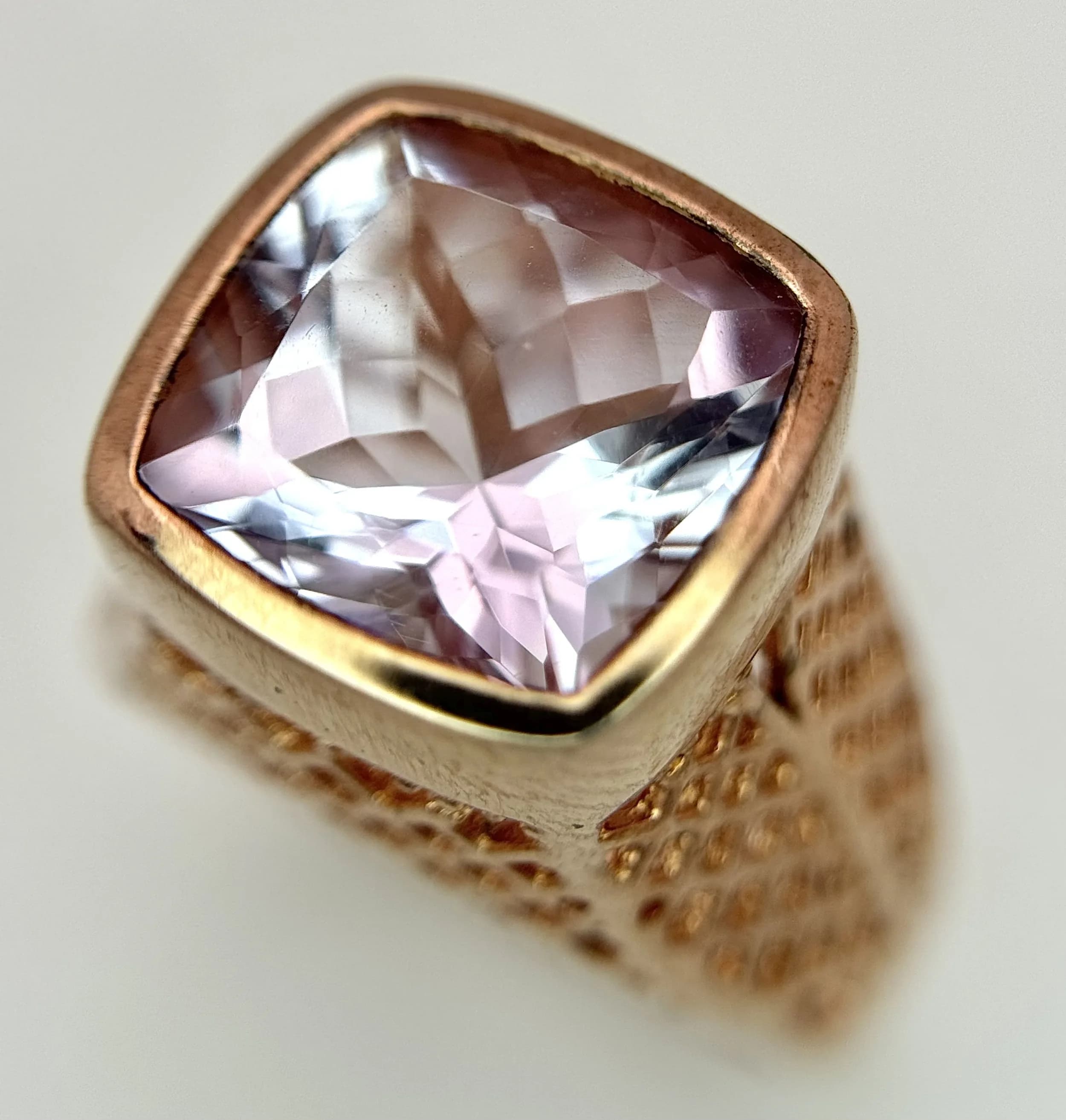 An Attractive Gold Gilded Sterling Silver High Mount Morganite Set Ring Size N. The Ring is set with a 1cm Cushion Cut Morganite, approximately 4 Carat. Gross Weight 7.54 grams.