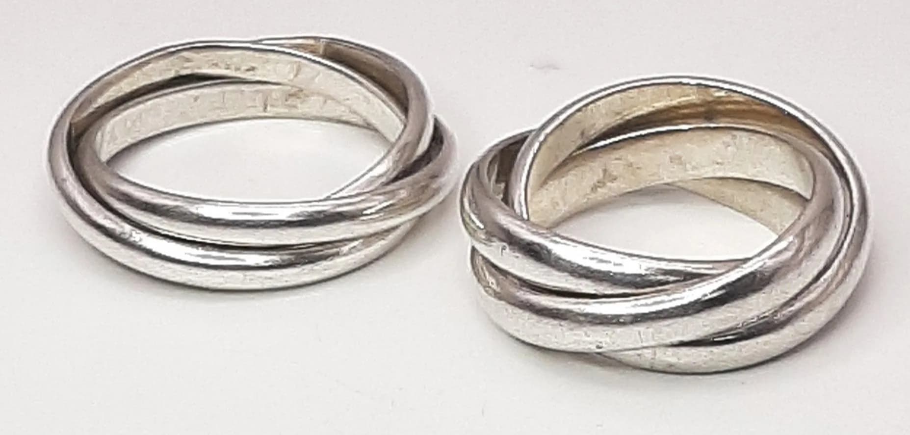 A PAIR OF STERLING SILVER, RUSSIAN WEDDING RINGS. 11.6G, SIZES I AND N. A/S NN 6004