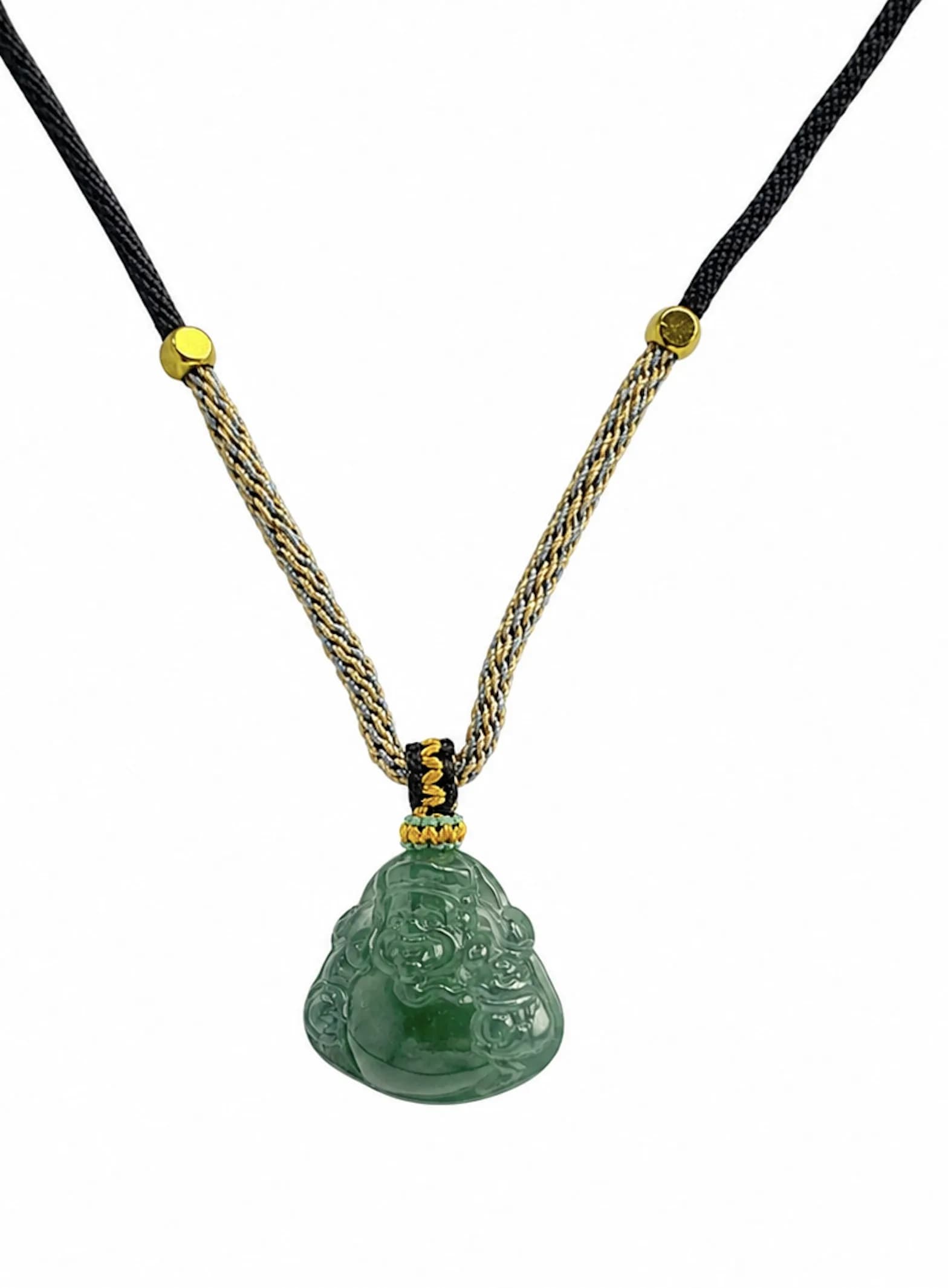 A Jade ‘Maitreya Buddha’ Pendant Necklace, complete with a jadeite certificate and adjustable cord. Pendant approximately 2 × 2cm. Necklace length approximately 33cm. Weight: 8.2g.