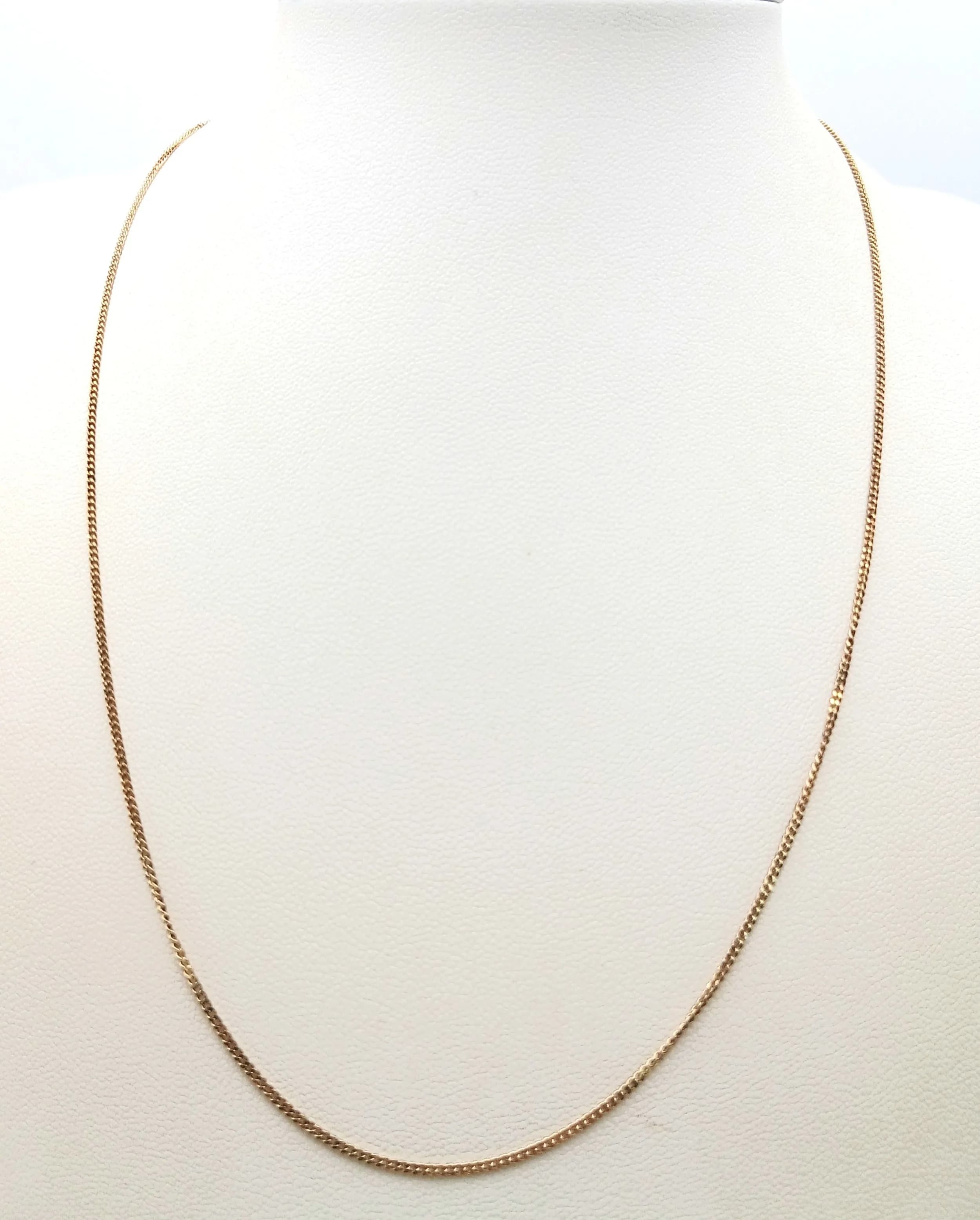 A 9K Yellow Gold Disappearing Necklace. 46cm. 1.8g.