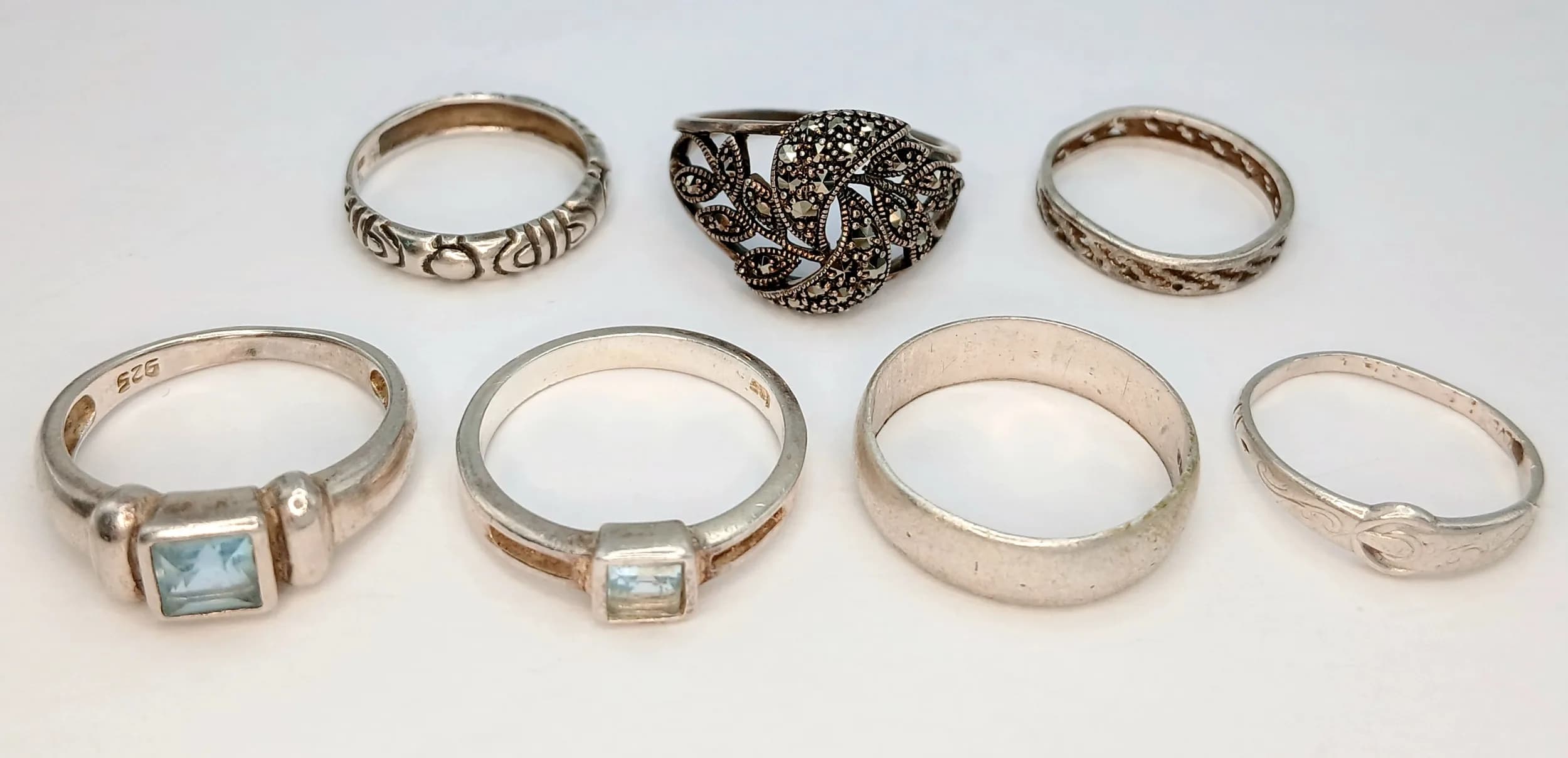 Seven Silver Rings. Comprising assorted silver dress rings, including stone set and decorative bands. 15.92g total weight.