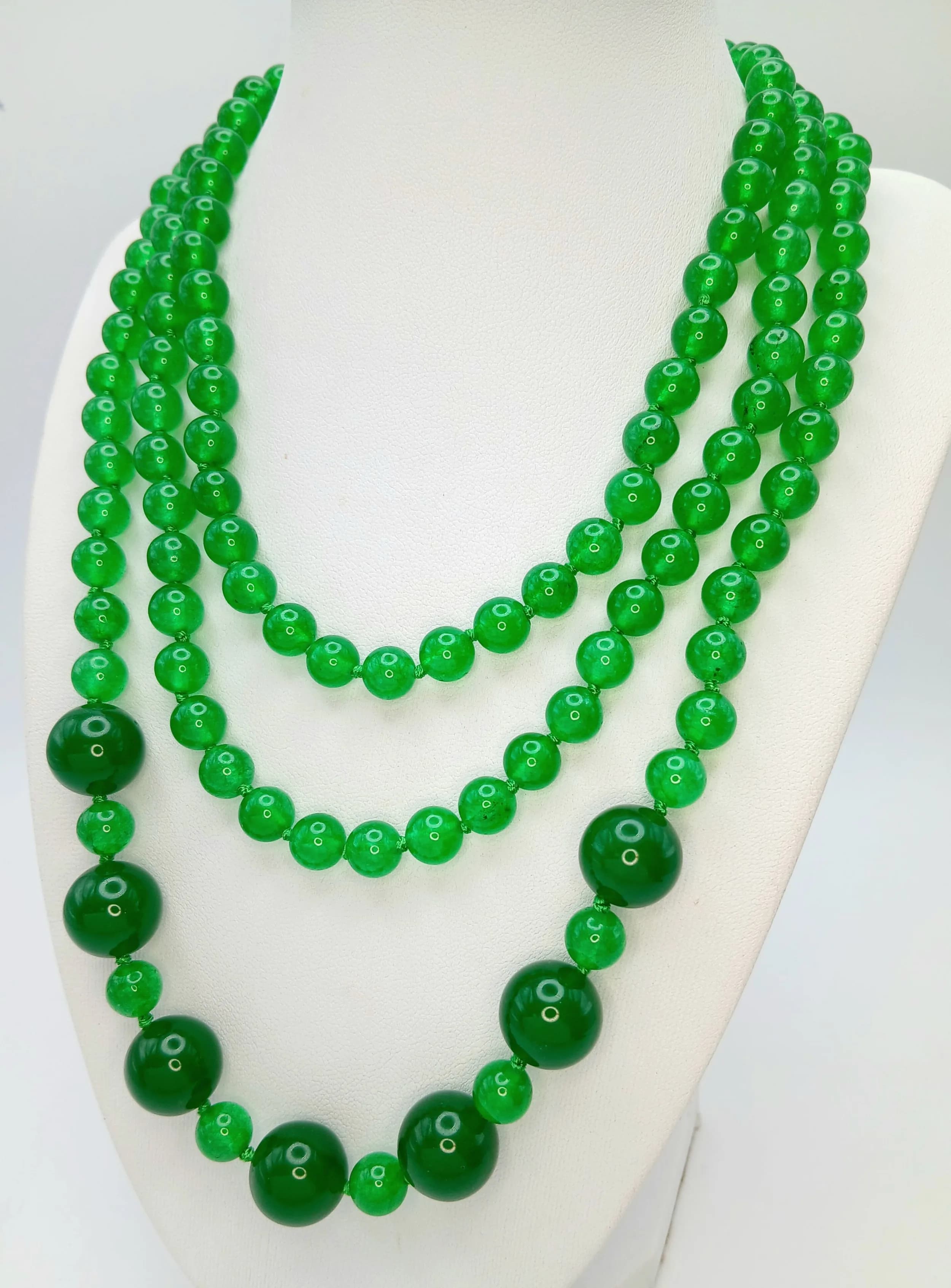 A Green Jade Rope Length Necklace. 8-16mm beads. 140cm length.