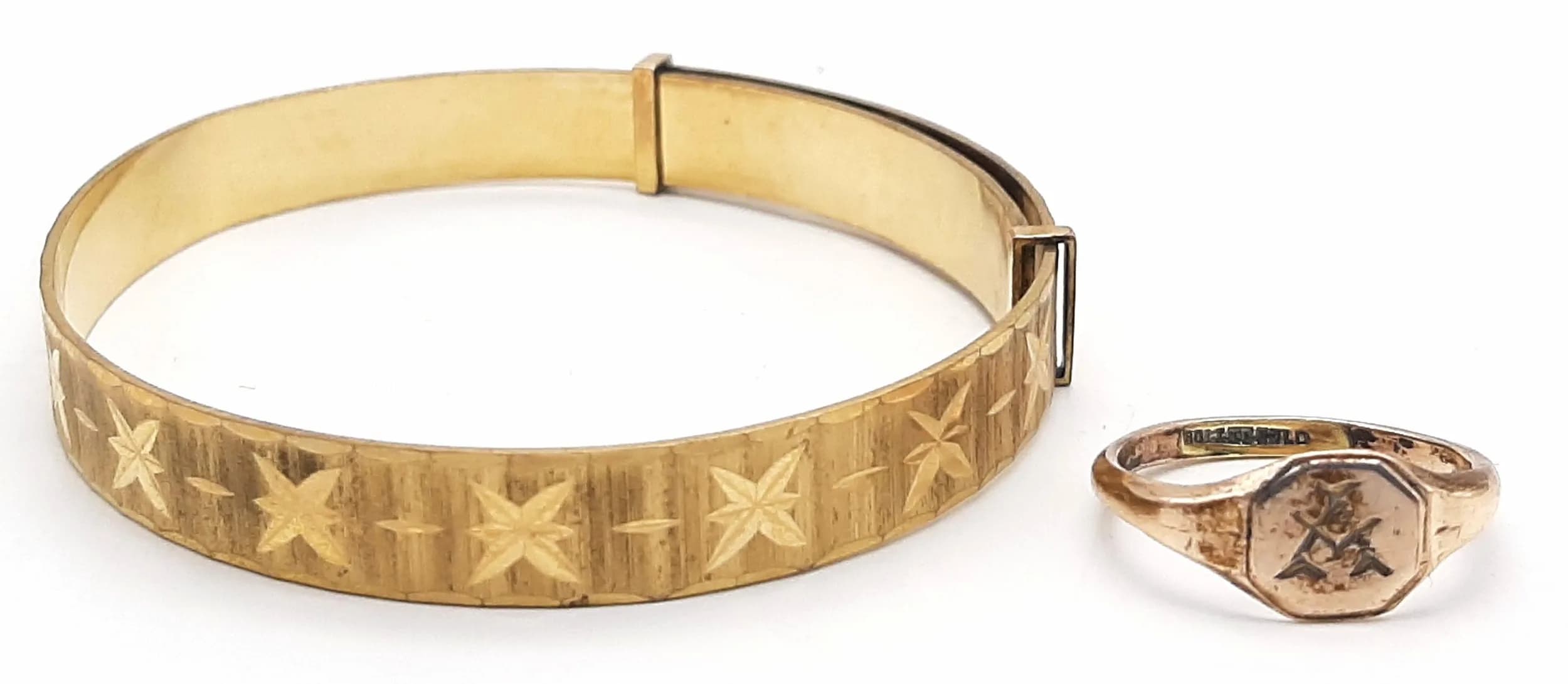 A Rolled Gold Adjustable Bangle and Signet Ring - Size L. 14.25g total weight.