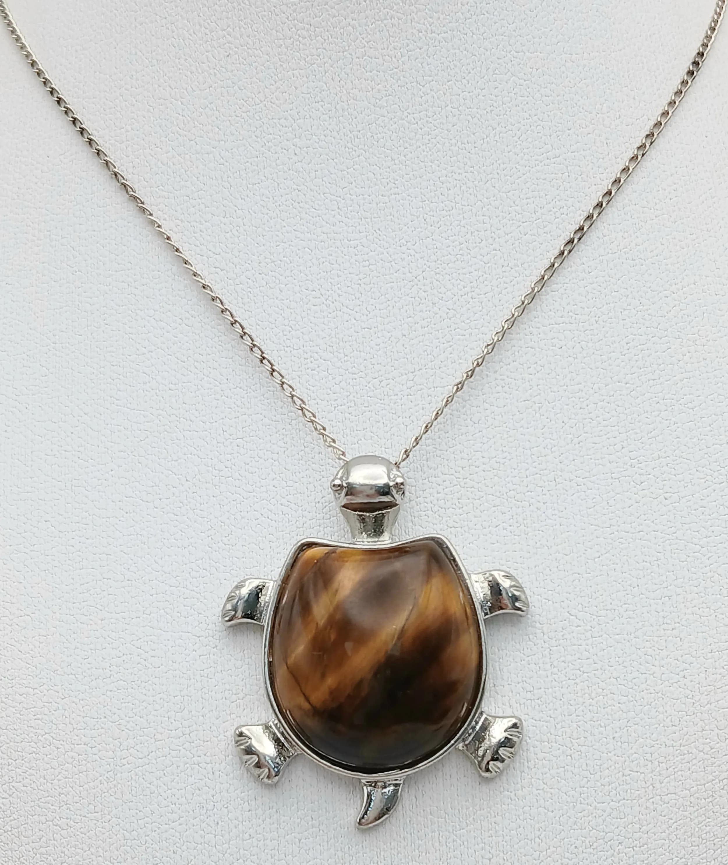 A Tigers Eye Turtle Pendant on a 925 Silver Chain. 4cm and 50cm.