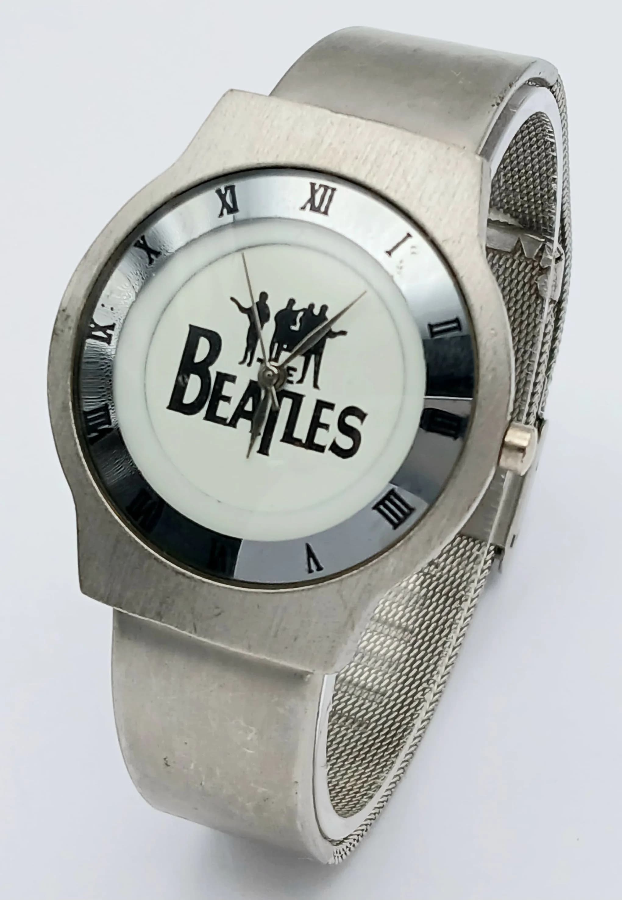 A BEATLES, STEEL MESH BRACELET, PROMOTIONAL WATCH. IN FULL WORKING ORDER. NEW BATTERY FITTED RECENTLY. S/A 1324 - 1