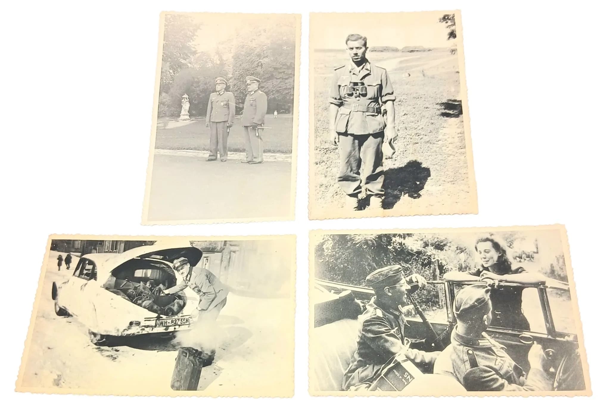 A Collection of Four German Military Archive Photographs. Black and white photographs depicting uniformed German soldiers, vehicles and military scenes. Stamped to reverse.