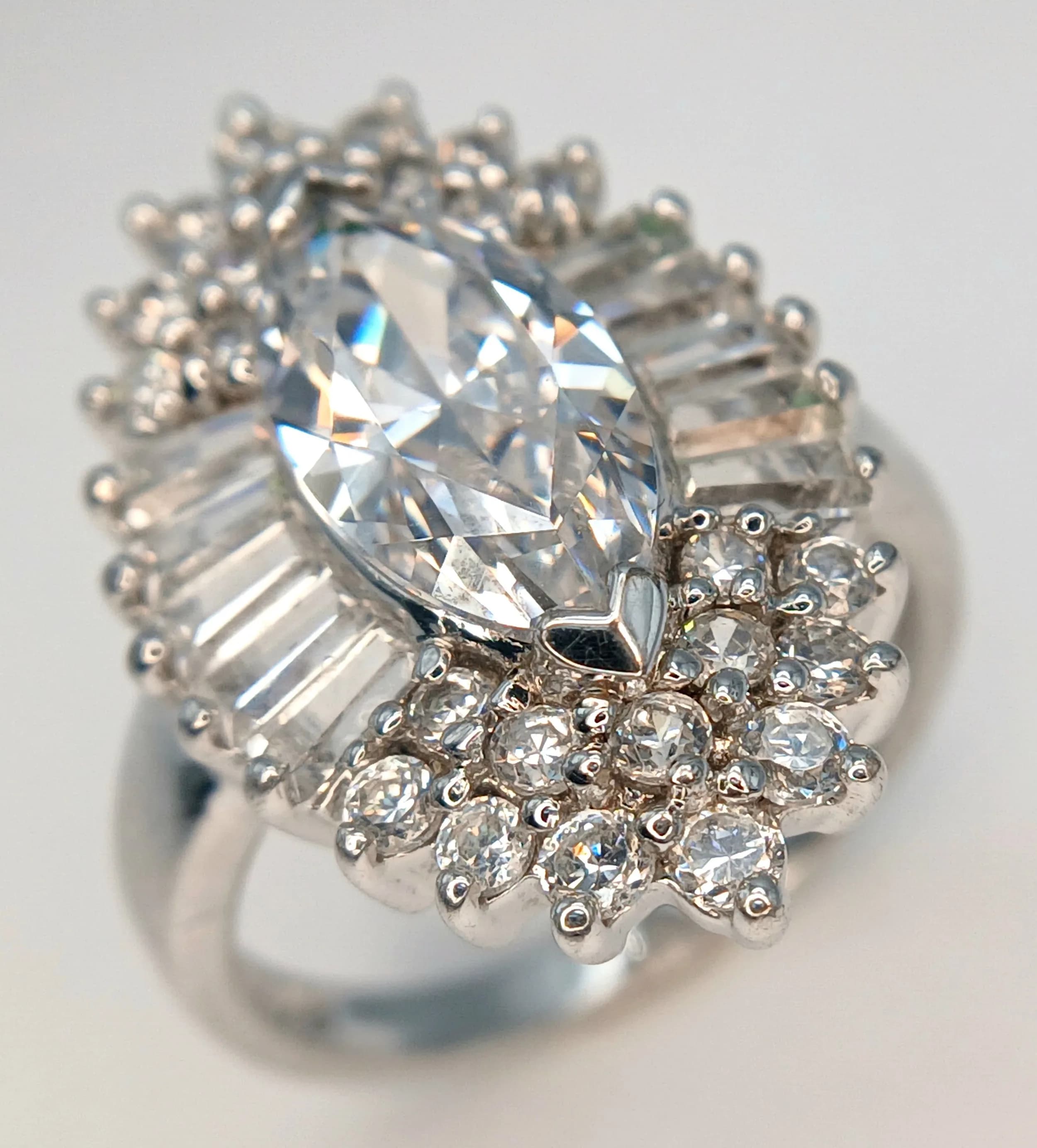 An Impressive Sterling Silver and Diamonique Cubic Zirconia Statement Rin. Size P. The Ring measures 2.6cm Length at the crown and is set with Diamonique Cubic Zirconia. The Ring has a gross weight of 6.6 grams.