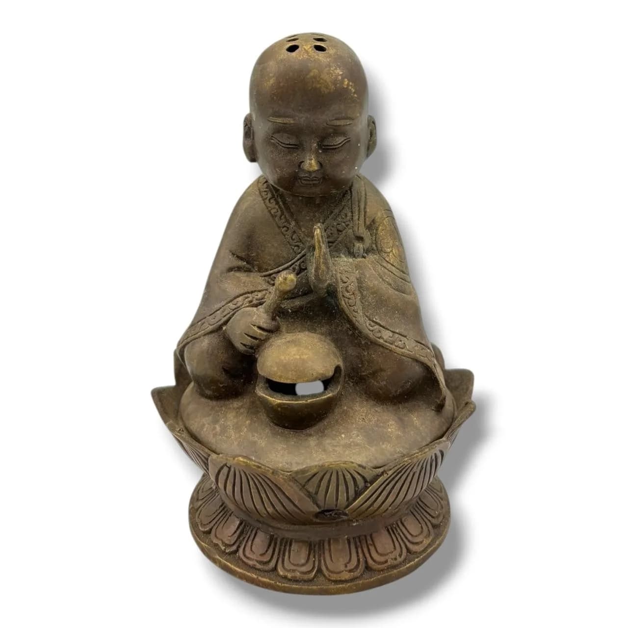 An antique Asian Bronze Figure of a Praying Monk Incense Burner. Modelled as a young Buddhist novice seated in meditation upon a lotus-form base, the figure holds a wooden fish striker in one hand while the other is raised in prayer. The robe is finely decorated with engraved borders and auspicious roundels to the reverse. Height 13.5 cm; width 8.5 cm. Please see photos or request a condition report.This item is held at Cadmore ASIAN Office in Vietnam and will be shipped from there. Buyers will be responsible for direct shipping payments. Delivery will take slightly longer.