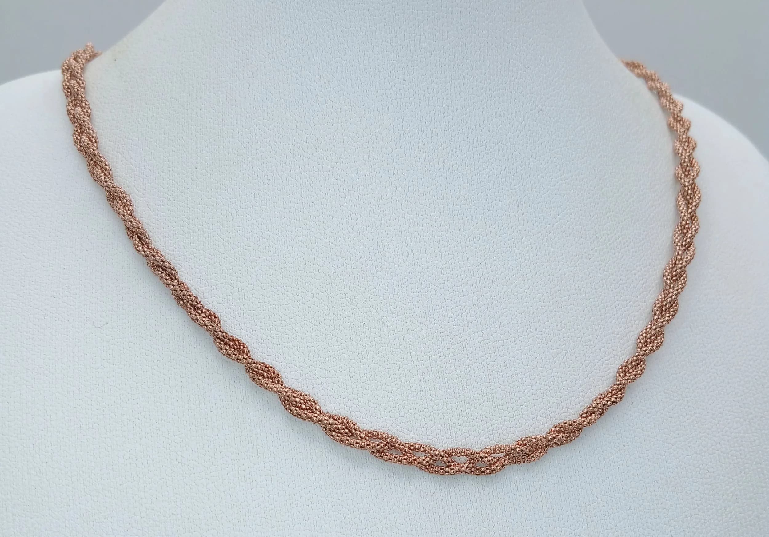A Rose Gold Gilded Sterling Silver Interwoven Design Necklace-46cm Length. 4mm width and weighs 6.26 grams.