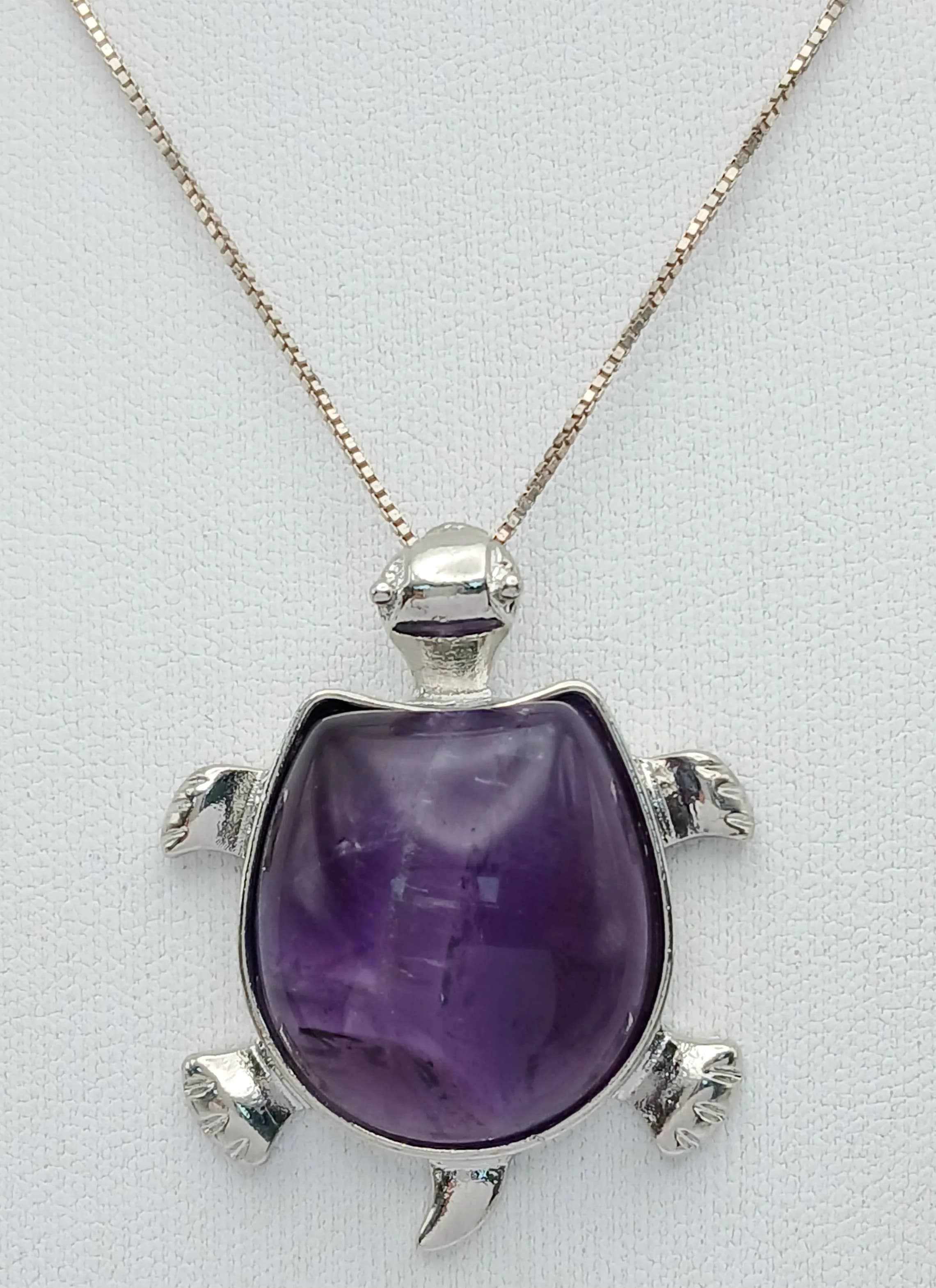 An Amethyst Turtle Pendant on a 925 Silver Chain. 4cm and 48cm.