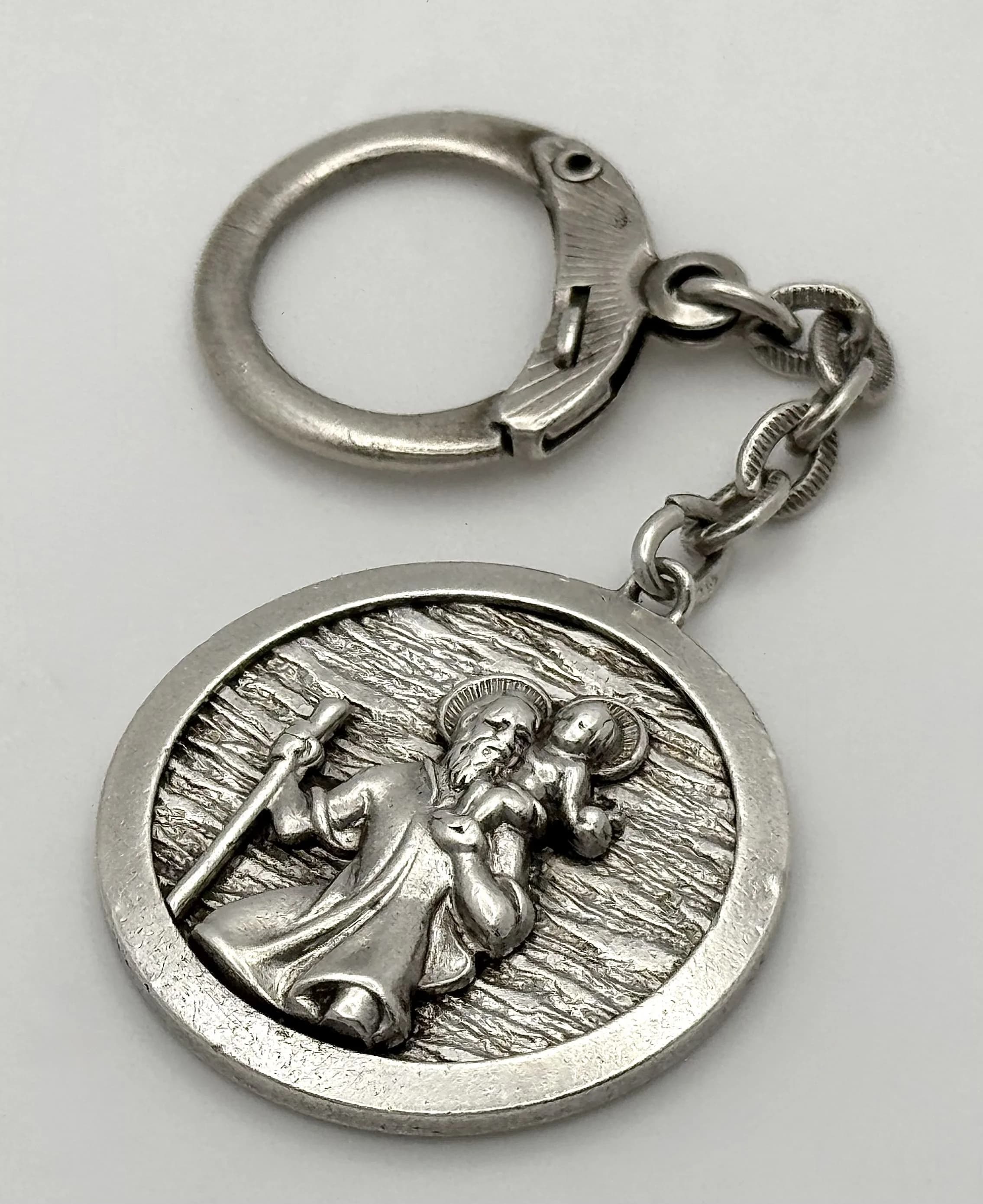 A Sterling Silver St. Christopher Medallion Keychain. 8cm. 15.88g.