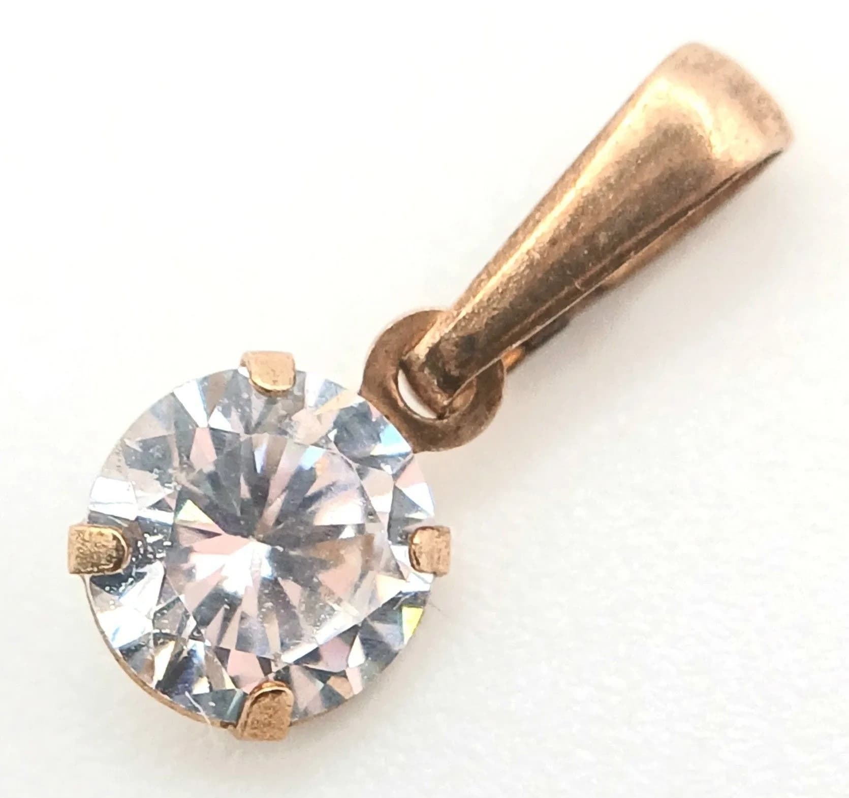 A 9K Yellow Gold White Stone Pendant. 12mm.