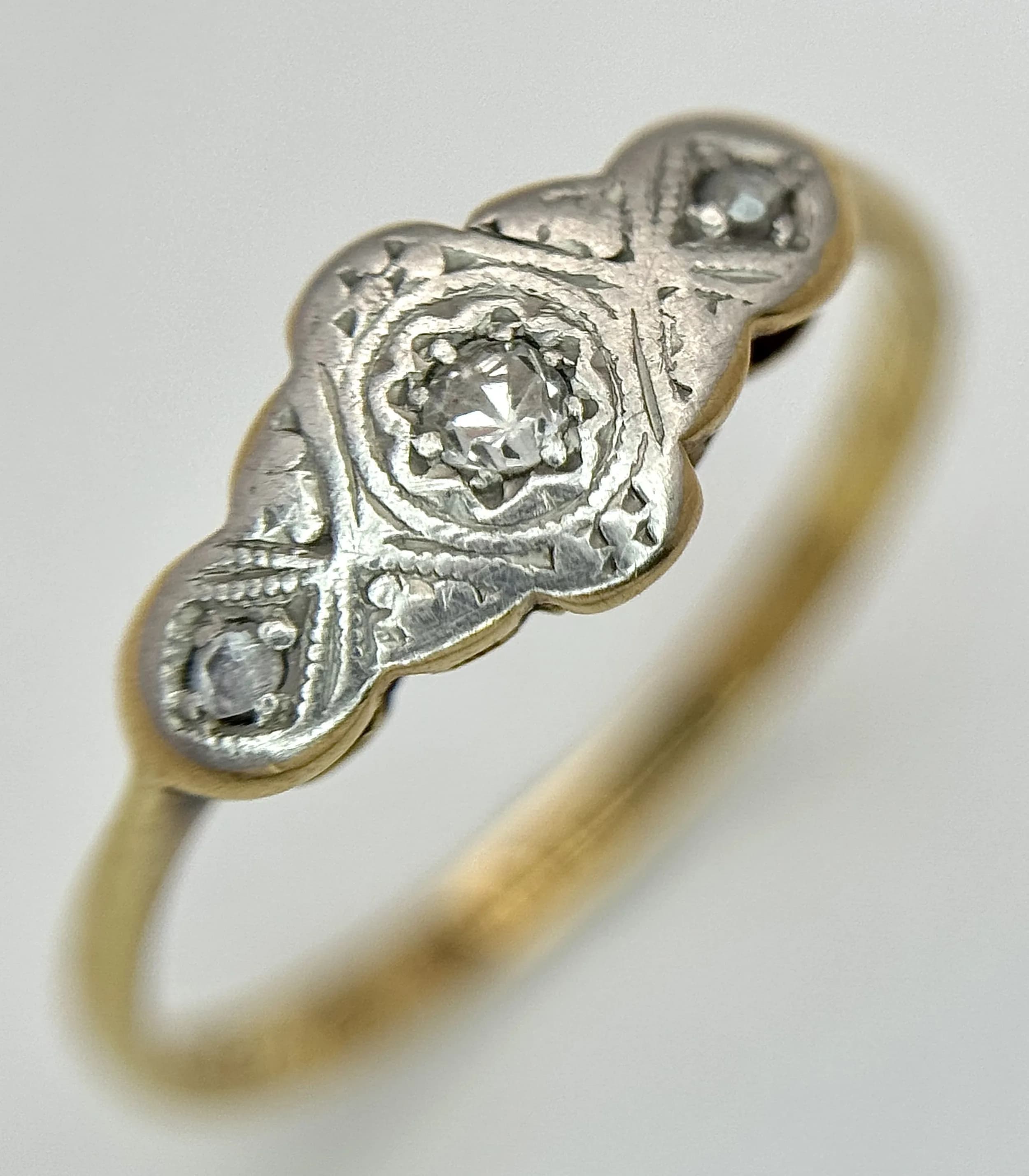 An 18K yellow gold diamond vintage ring, 0.02ct diamond weight, 1.6g total weight, ring size L. Ref: SH2210I