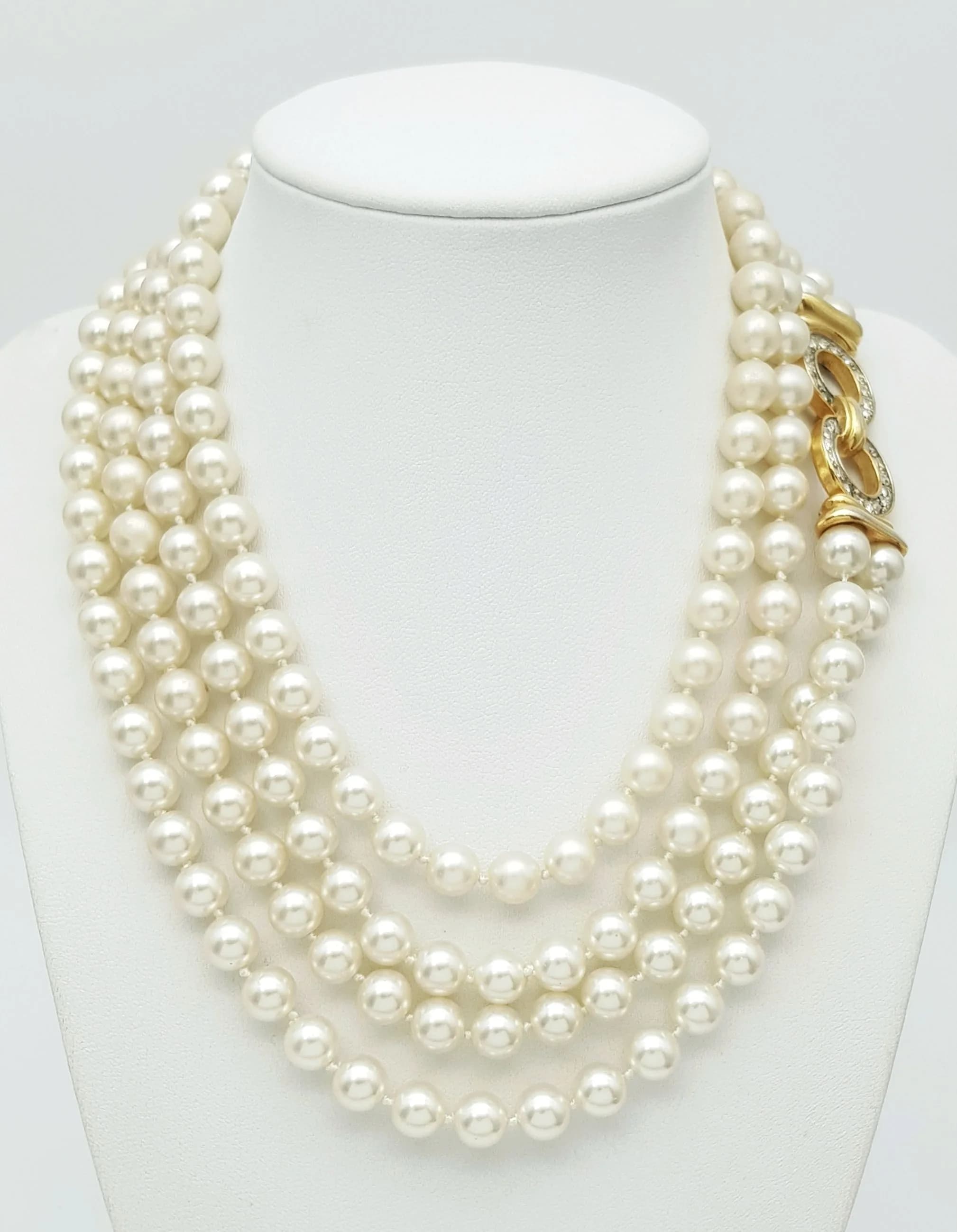 A Vintage Gold Gilded and Crystal Set Double String Pearl Necklace. 86cm Length. 8mm Diameter Pearls. Gross weight approximately 125 grams.