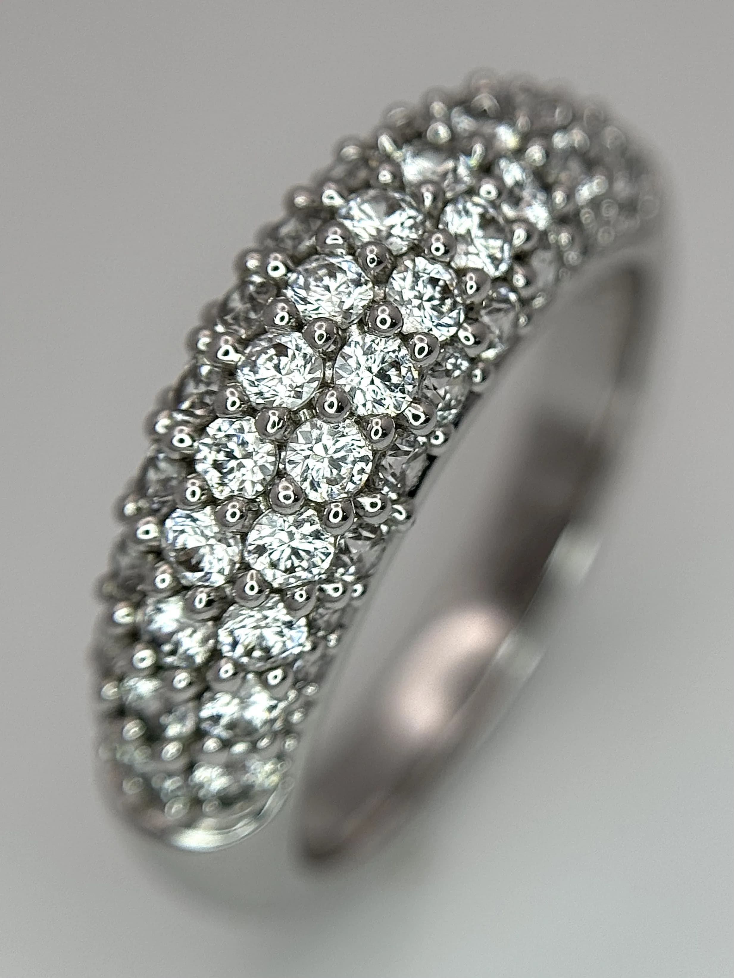 A Swarovski Crystal Set Rhodium Plated Ring. Swarovski marked. Size 58/UK size O - P.