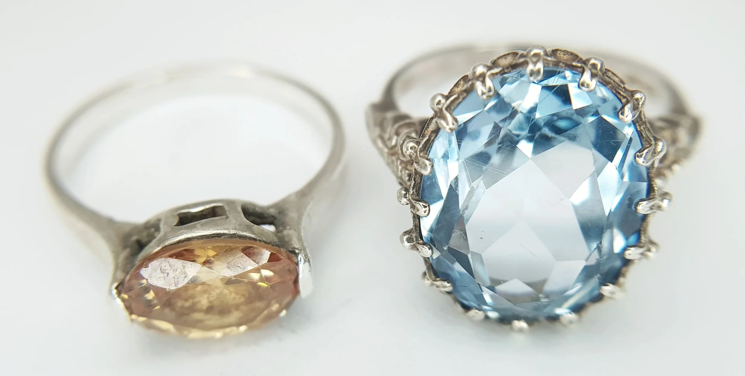 A PAIR OF STERLING SILVER, STONE SET RINGS. BOTH SIZE N 1/2. 9.4G. TREV SIL 6007
