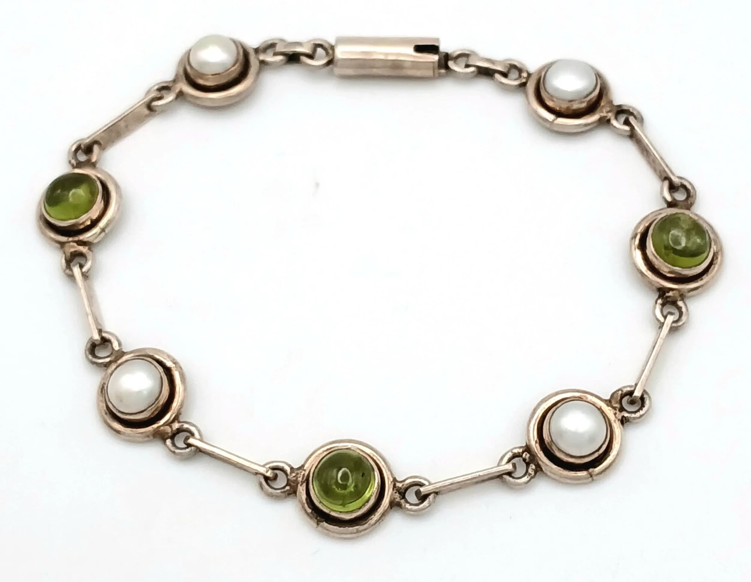 A Vintage Silver, Jaypore Link, Cultured Freshwater Pearl and Peridot Bracelet-18.5cm Length. 1cm wide at widest point. Gross weight 12.13 grams.