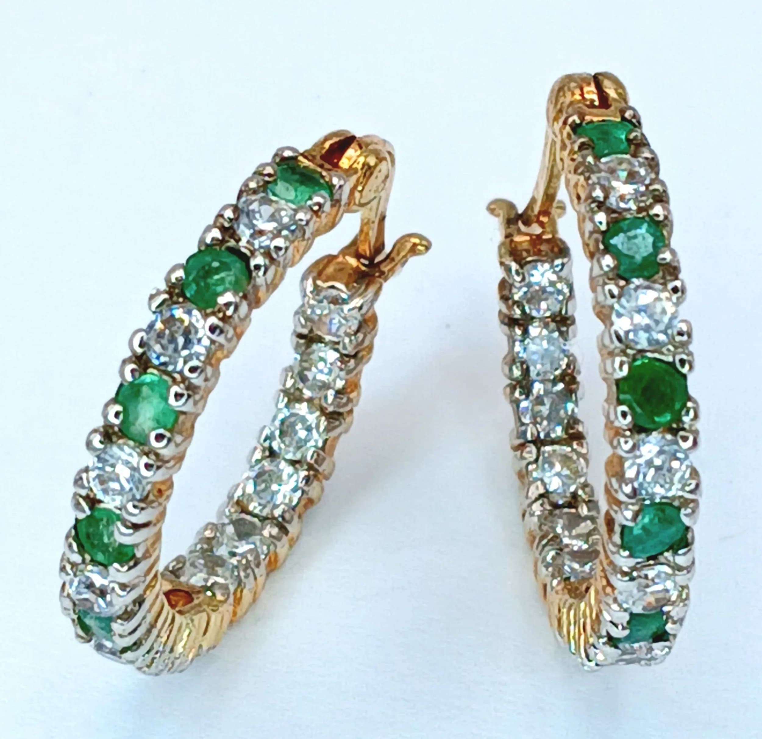 A VERY PRETTY PAIR OF GOLD FILLED SMALL HOOP EARRINGS WITH WHITE AND GREEN STONES . 3gms