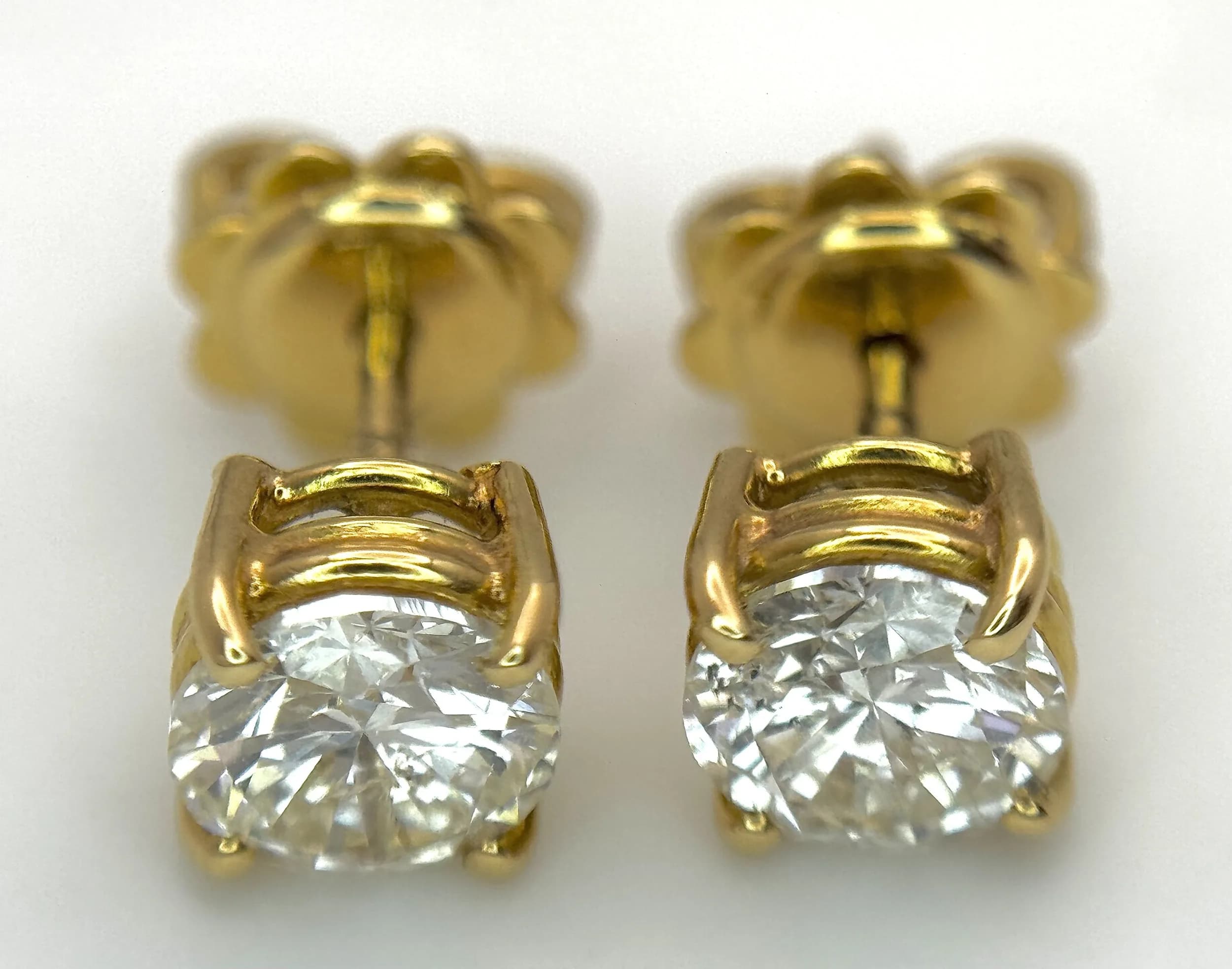 A Pair of 18K Yellow Gold Diamond Stud Earrings. Round cut diamonds circa 1.64ctw. 2.64g total weight. Ref: 15158706
