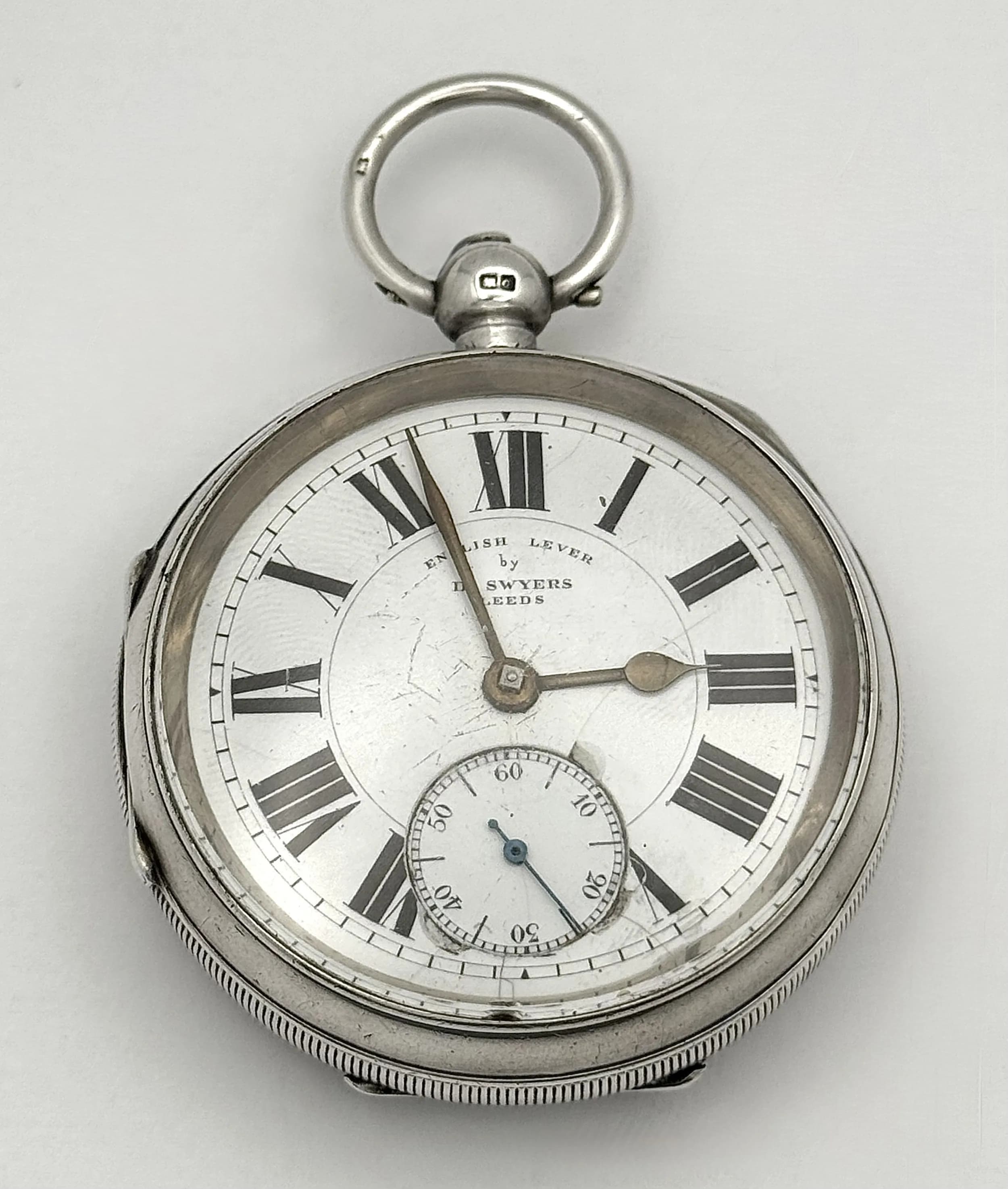 An Antique Hallmarked Silver Fusee Pocket Watch. English Lever by D. Swyers, Leeds. Hallmarked Chester, 1900. Total Weight 143.69 Grams.