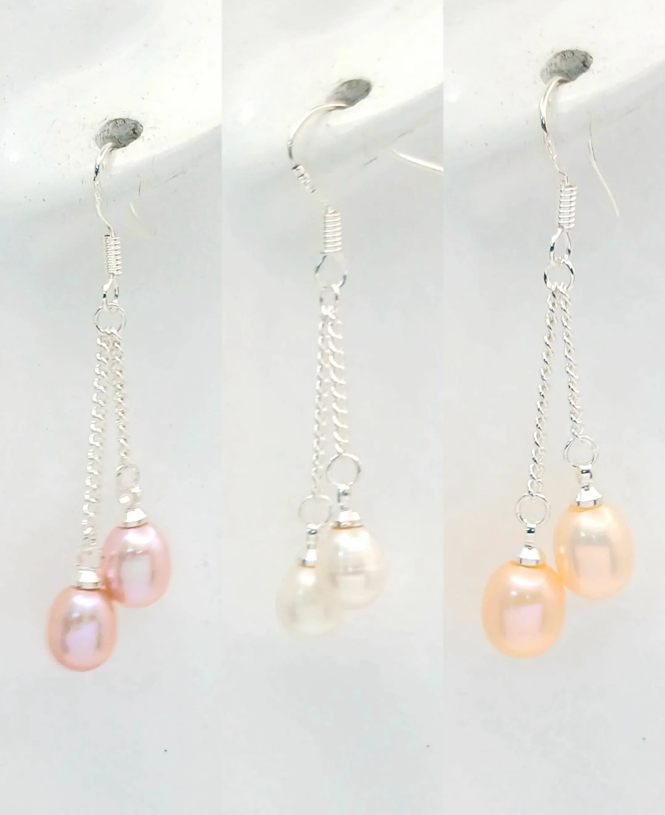 Three Beautiful Pairs of Pastel Freshwater Pearl Drop Earrings. Set in silver. 3cm drop.