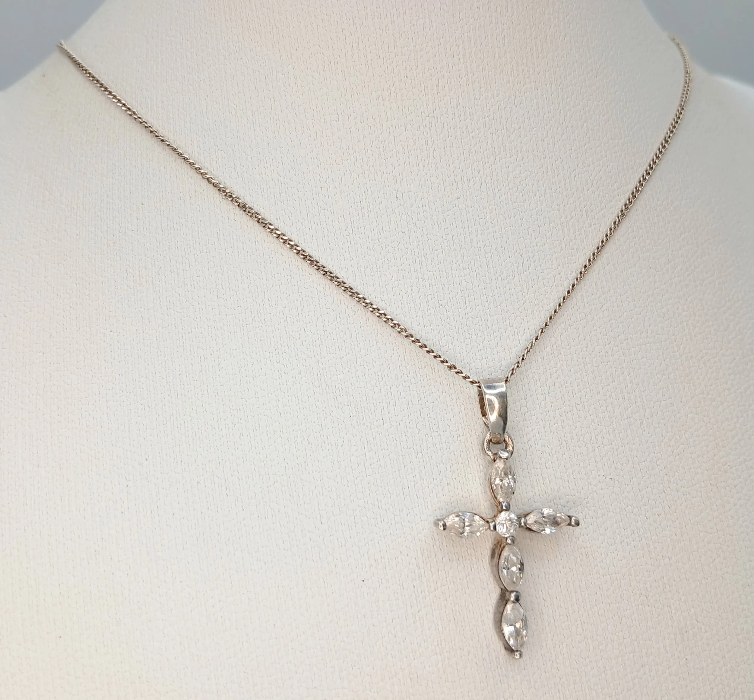 A Lovely 925 Sterling Silver Marquise-Cut CZ Cross Pendant Necklace - 41cm Length. Features a cross-shaped pendant set with marquise-cut CZ stones on a fine sterling silver chain. The pendant measures 3cm x 1.5cm. Gross weight 2.82 grams.