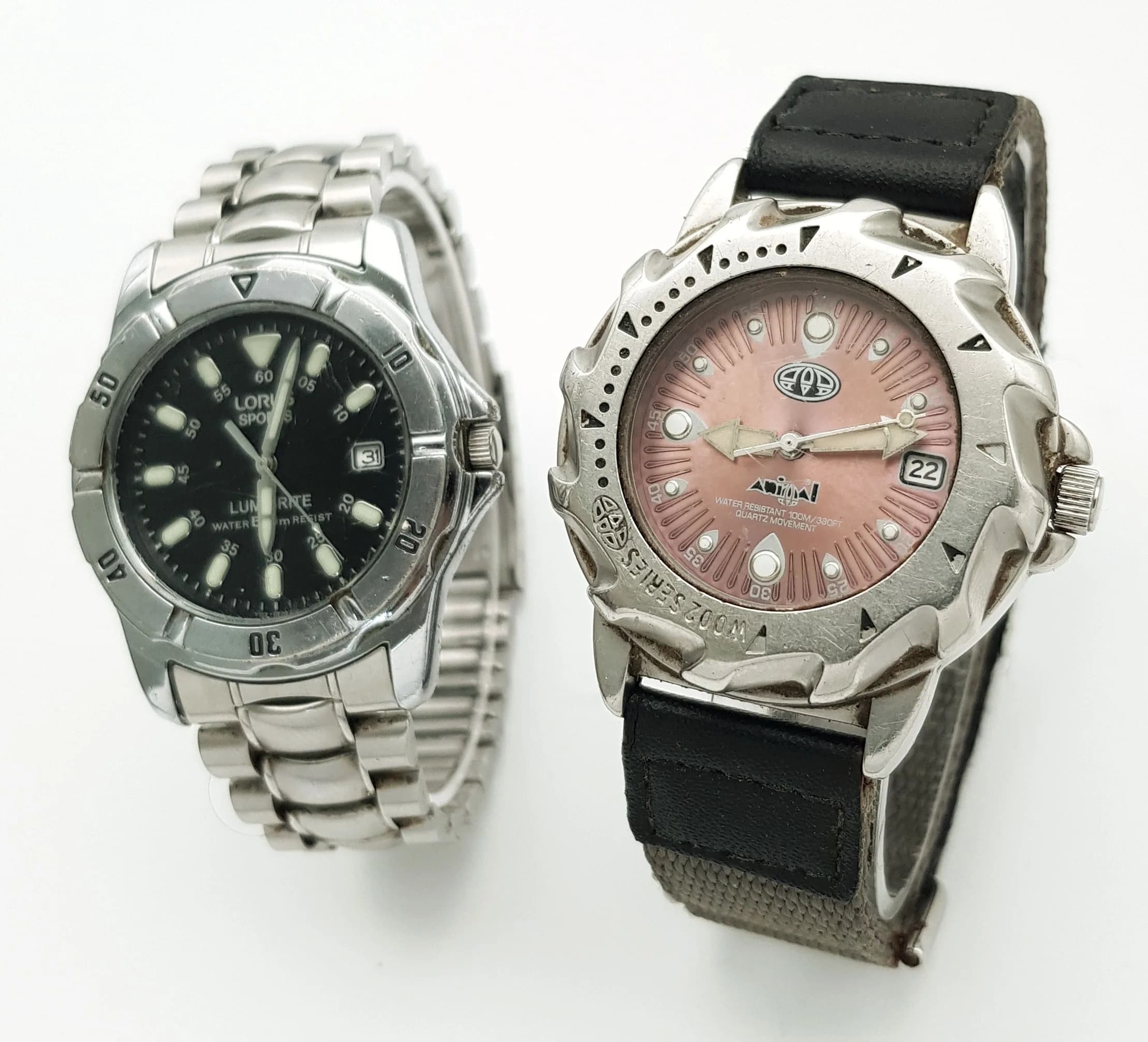 A PAIR OF SPORTS WATCHES. A STEEL BRACELET LORUS SPORTS AND AN ANIMAL ON MATERIAL VELCRO STRAP WATCH. BOTH IN FULL WORKING ORDER. NEW BATTERIES FITTED RECENTLY. S/A 1702 - 5