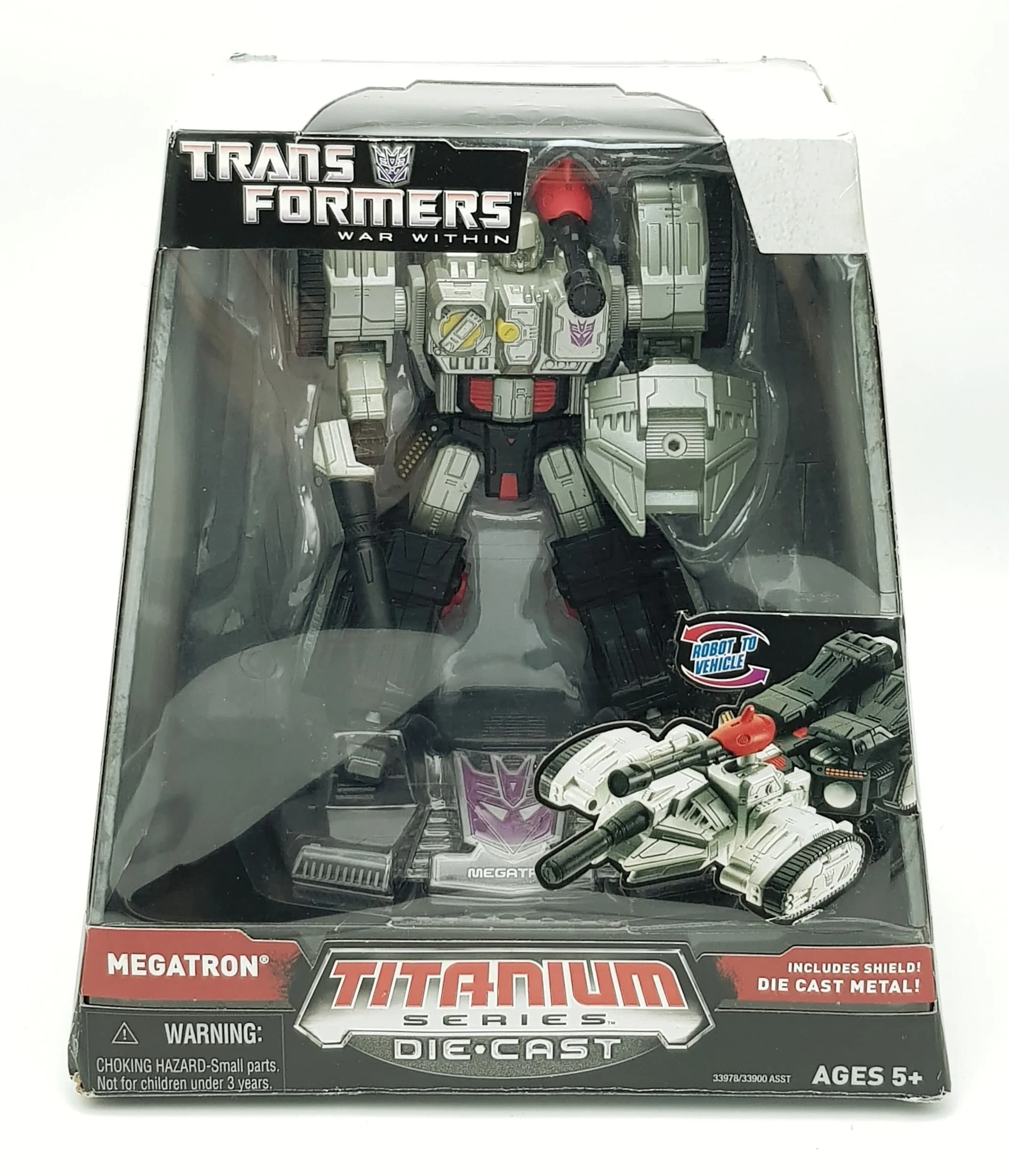 A vintage die cast Transformer by Hasbro. Complete in box. Good condition.