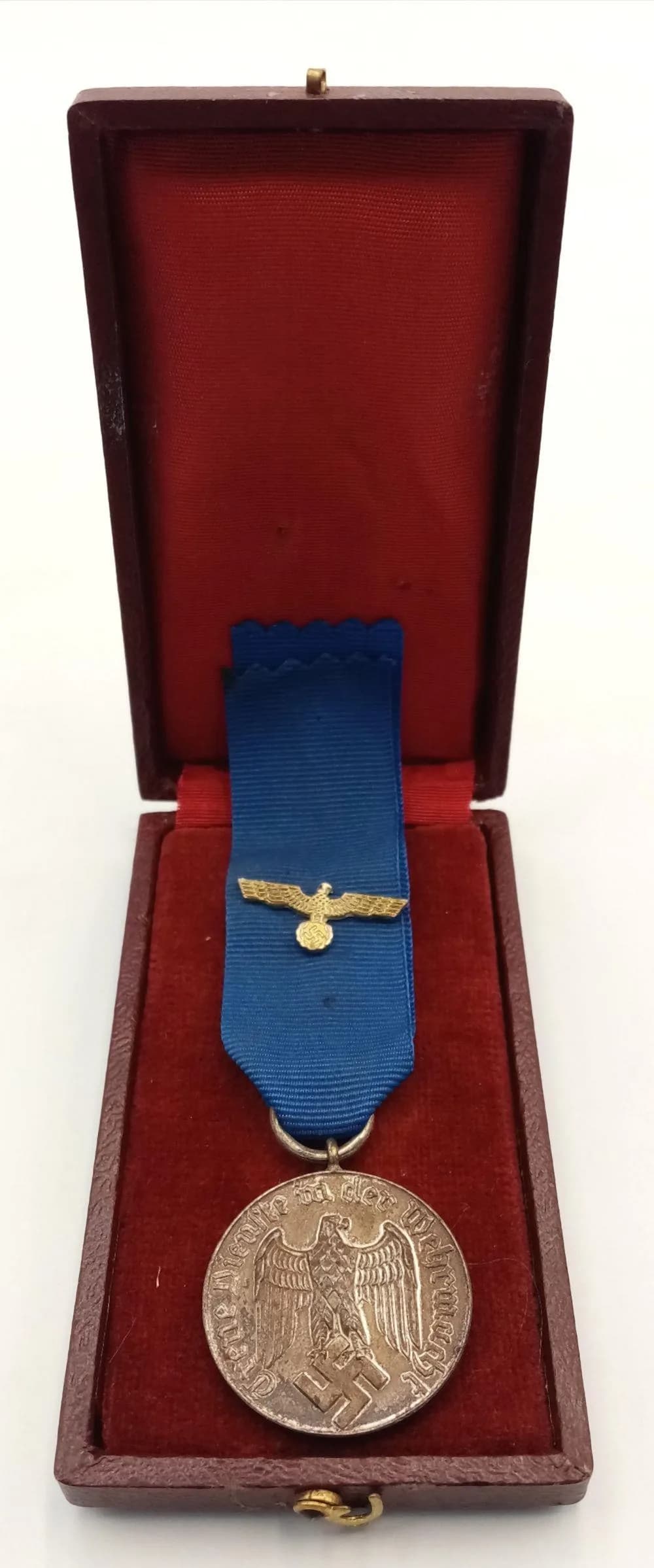 A 3rd Reich Wehrmacht 4 Year Long Service Medal with Ribbon. Comes with case.