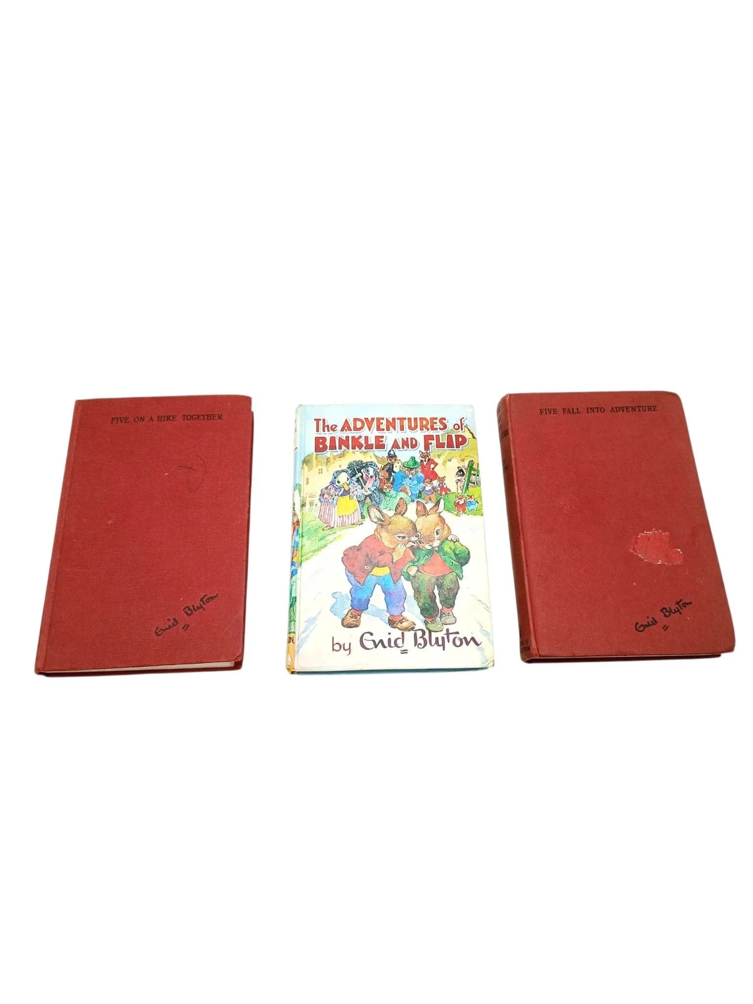 A trio of Vintage Enid Blyton children's books featuring two from the famous five adventure range and a Binkle and Flip adventure. Please see photos for condition