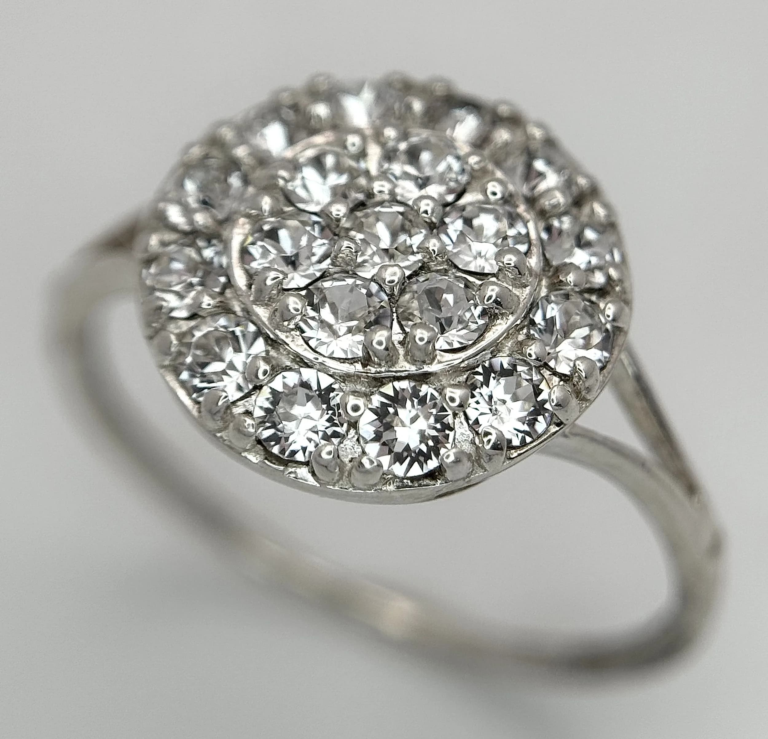 A 925 Silver White Stone Cluster Ring. Size S - T. 2.12g total weight.