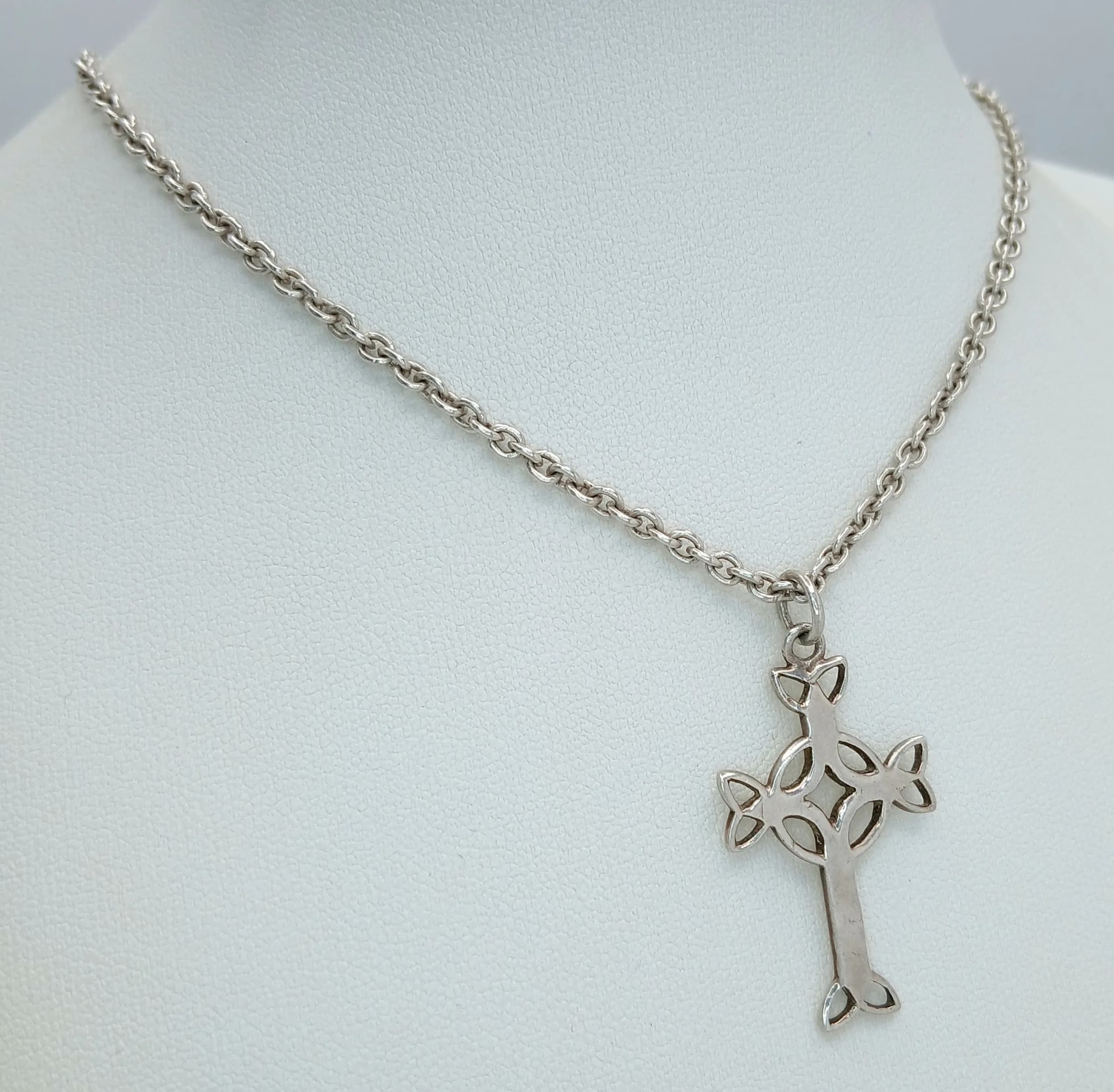 A Lovely 925 Sterling Silver Celtic Cross Pendant Necklace - 46cm Length. Features an openwork Celtic cross pendant on a fine curb link chain. The pendant measures 3cm x 2cm. Gross weight 9.07 grams.
