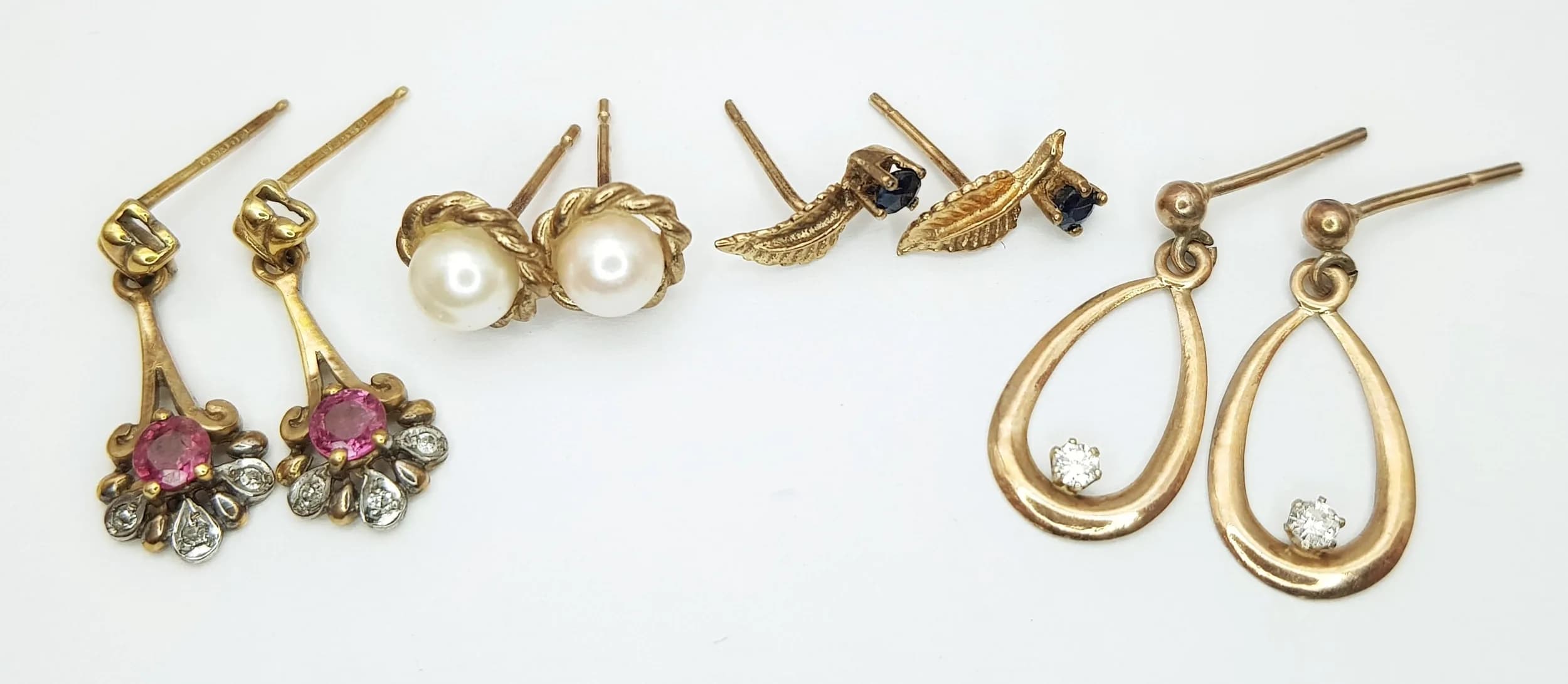 Four Pairs of Different Style 9K Gold Earrings. 3.5g total weight.