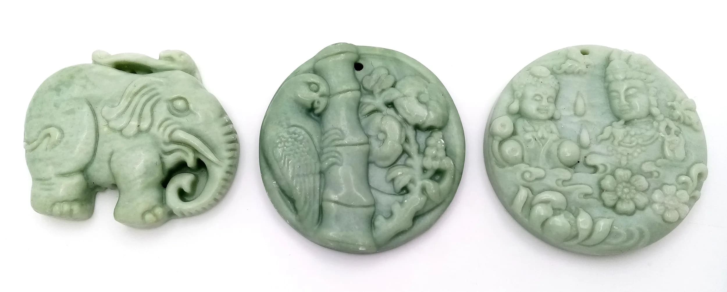 Three Different Themed Asian Greenstone Pendants. 5cm