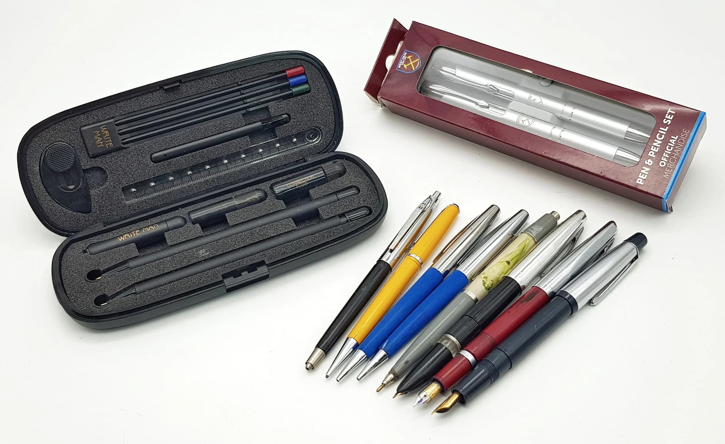 A Collection of Assorted Pens and Pencil Sets. Includes a boxed West Ham United official merchandise pen and pencil set, a boxed Write Man multifunction pen set with accessories, and a selection of assorted vintage and modern pens in various colours and finishes. Please see photos for details.