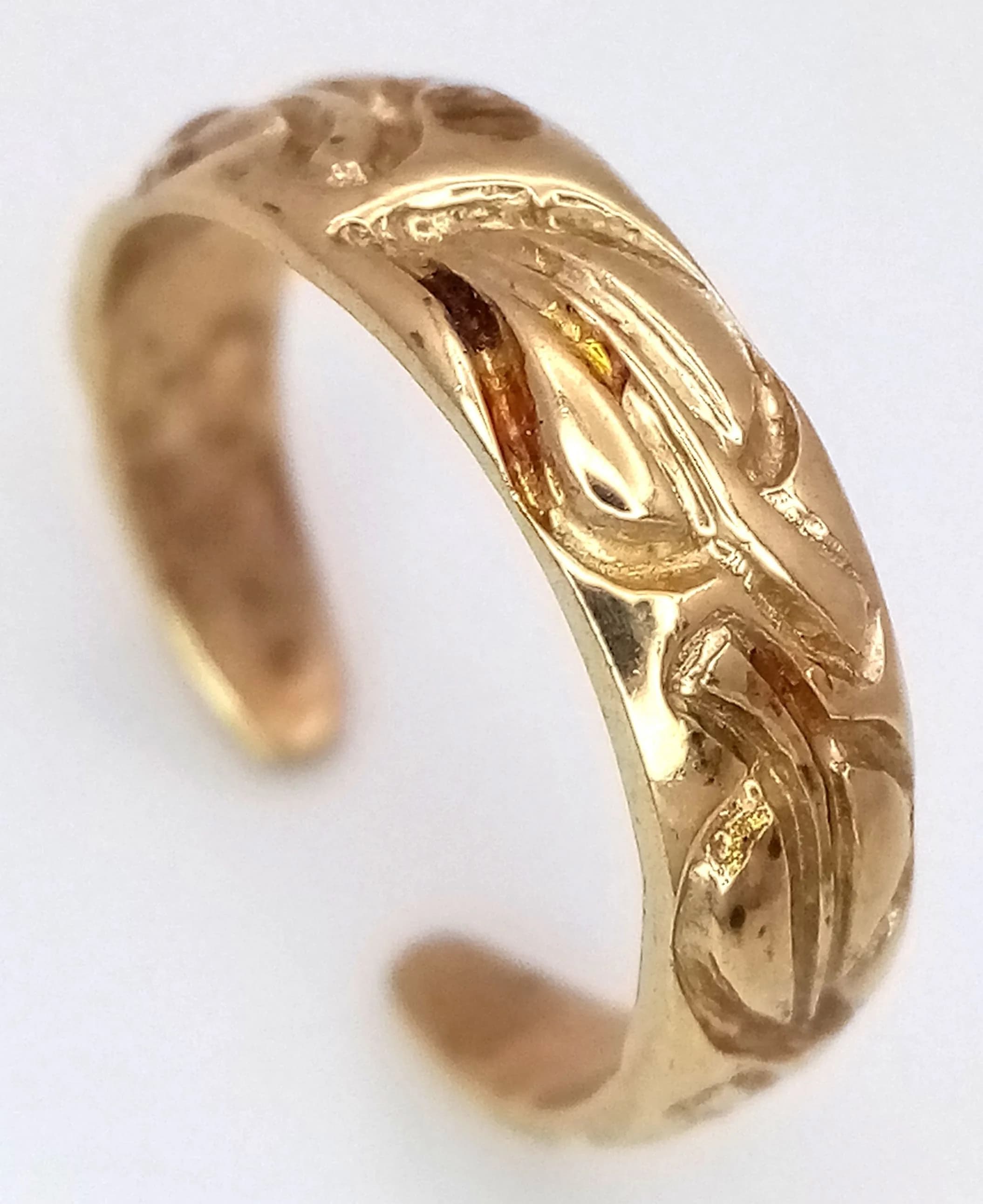 A Small 9K Gold Band with Open Ends. Size G 1/2. 1.85g.