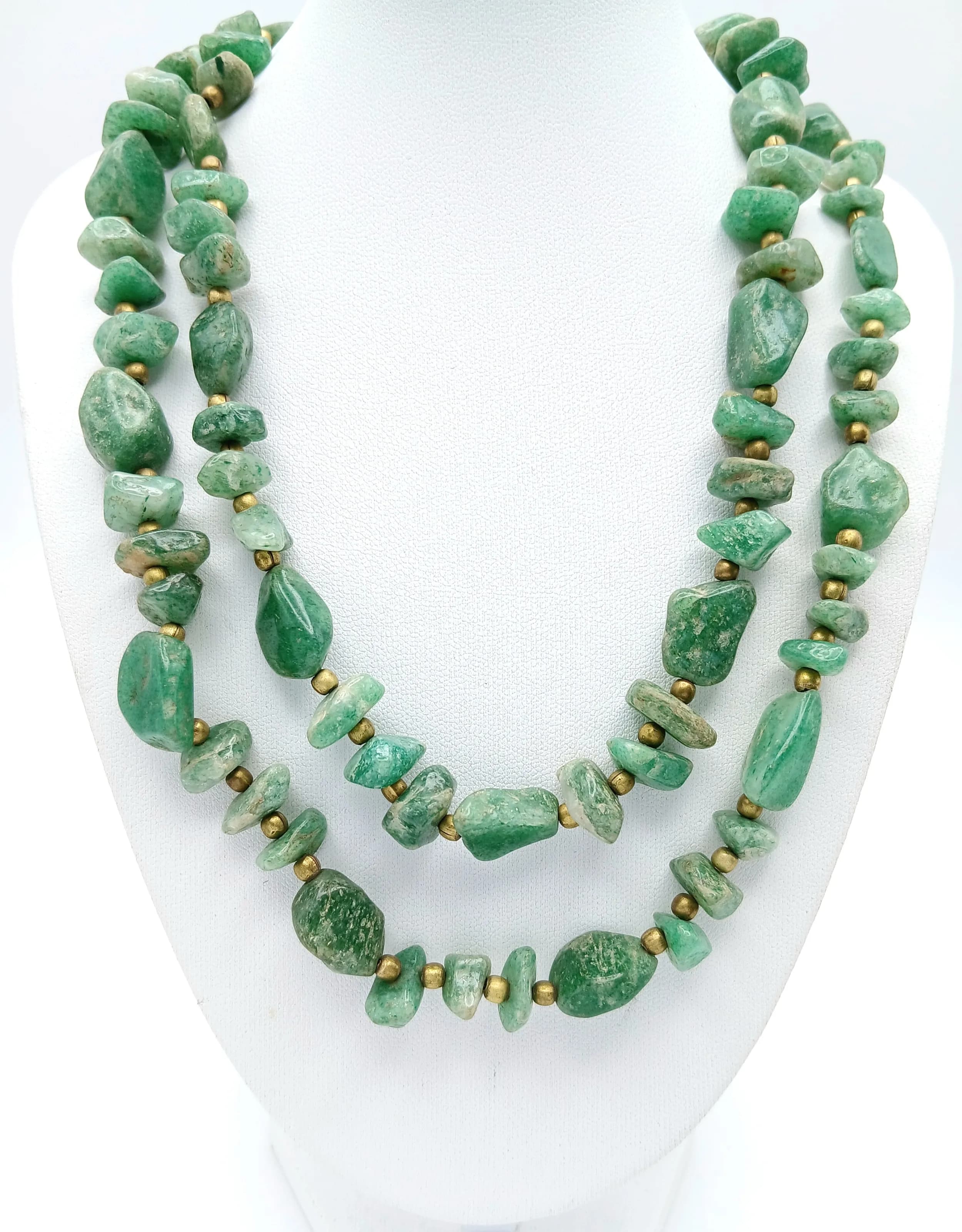 A matinee length elegance green aventurine beaded necklace. Approx 86cm length. Please see photos for details.
