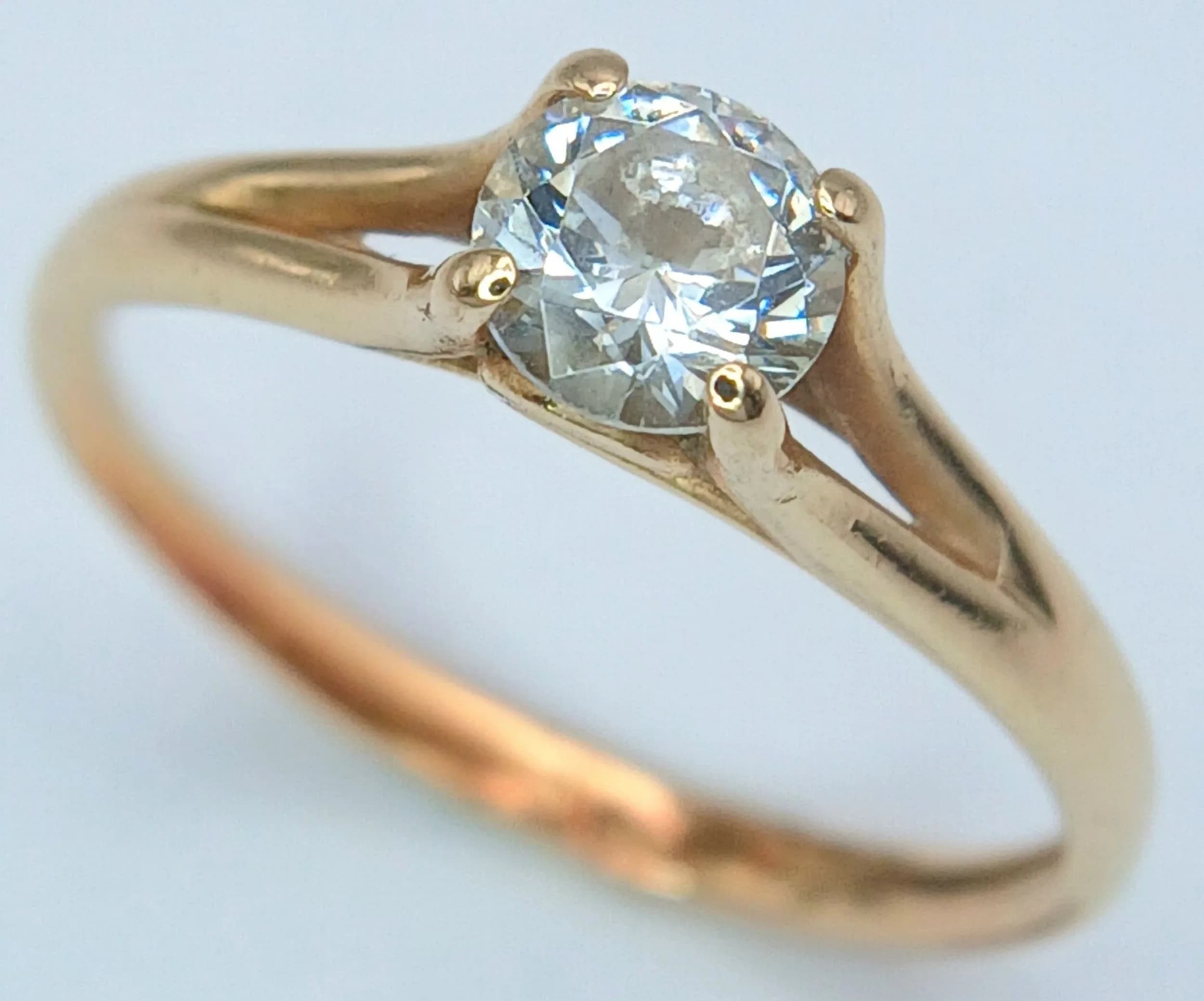 A 14K Yellow Gold Diamond Solitaire Ring. 0.35ct round brilliant cut diamond having H colour and SI3 clarity. Size L 1/2. 1.78g. Ref: 029825