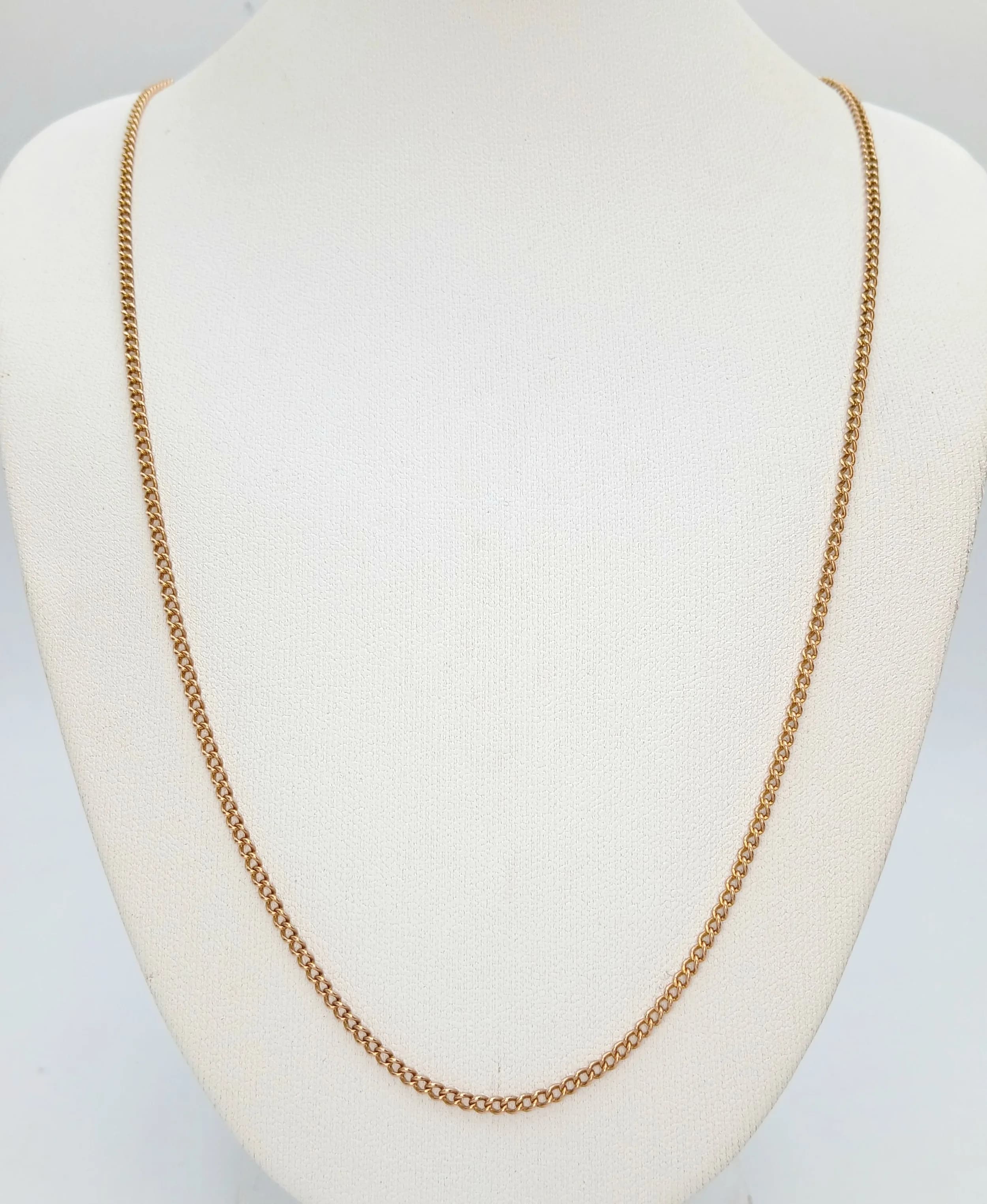 A 14K Yellow Gold (tests as) Curb Link Chain Necklace. 57cm. 5.6g.