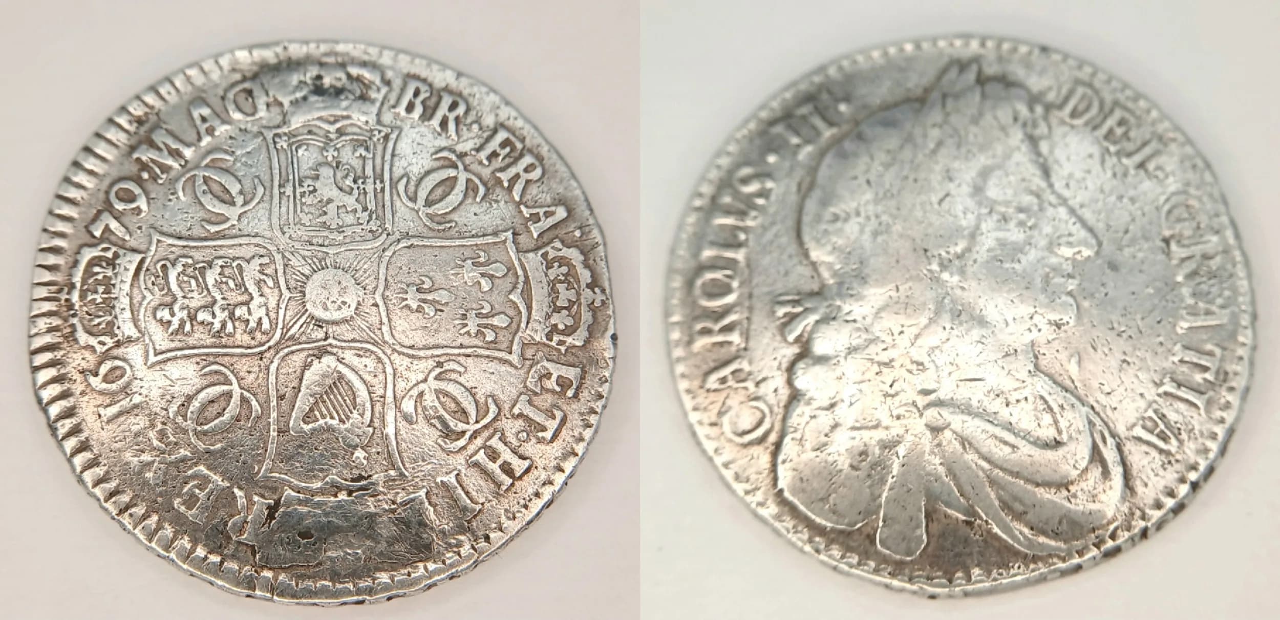 1679 CHARLES II SILVER HALF CROWN coin. ‘TRICESIMO PRIMO’ EDGE. Very Fine/ Extra Fine. Having bold and raised Detail to both sides. A Better Grade Coin. Please see pictures.