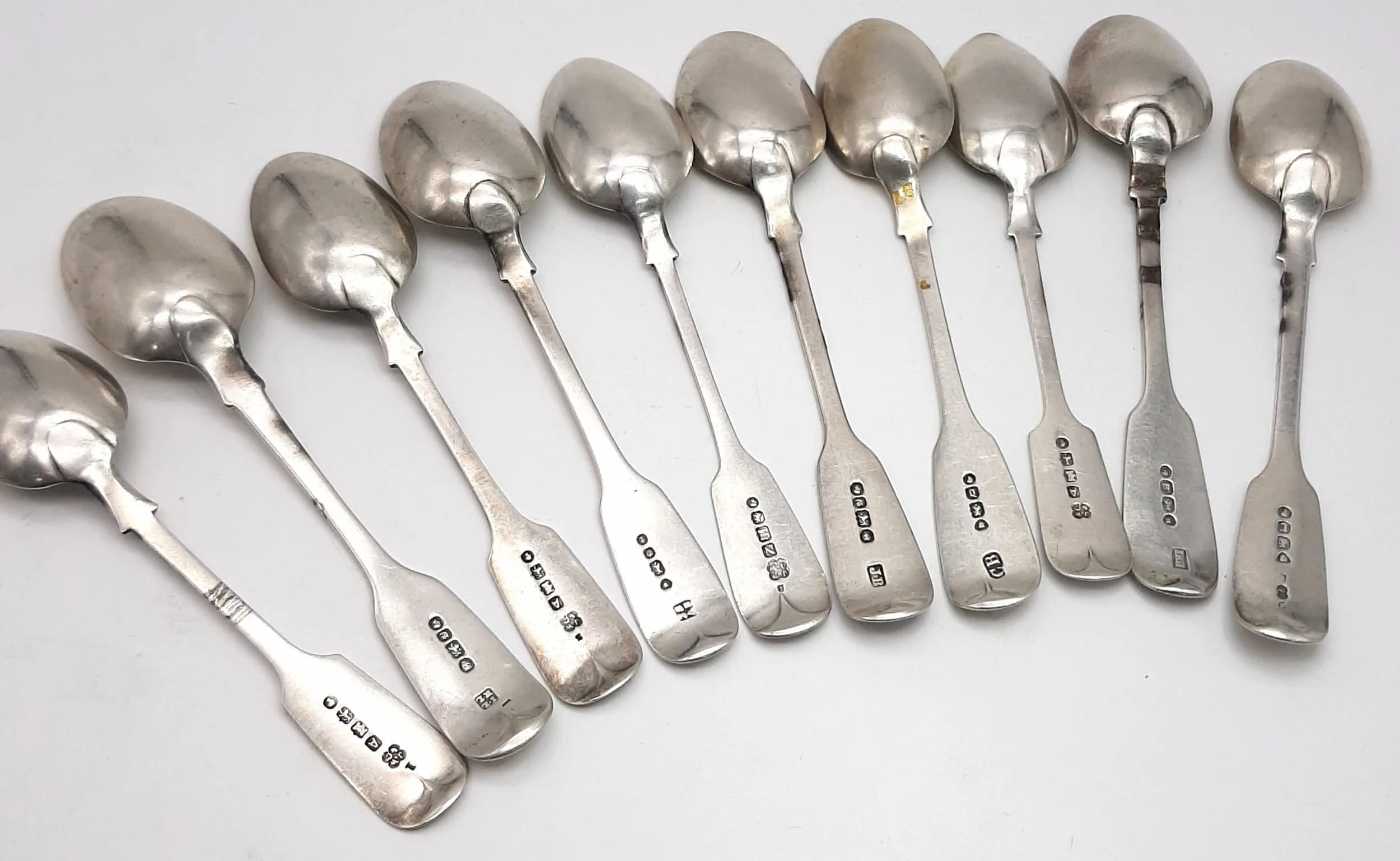 Ten Victorian Sterling Silver Tea Spoons. Various hallmark years and makers marks - including James and Josiah Williams of Exeter. 202g total weight.