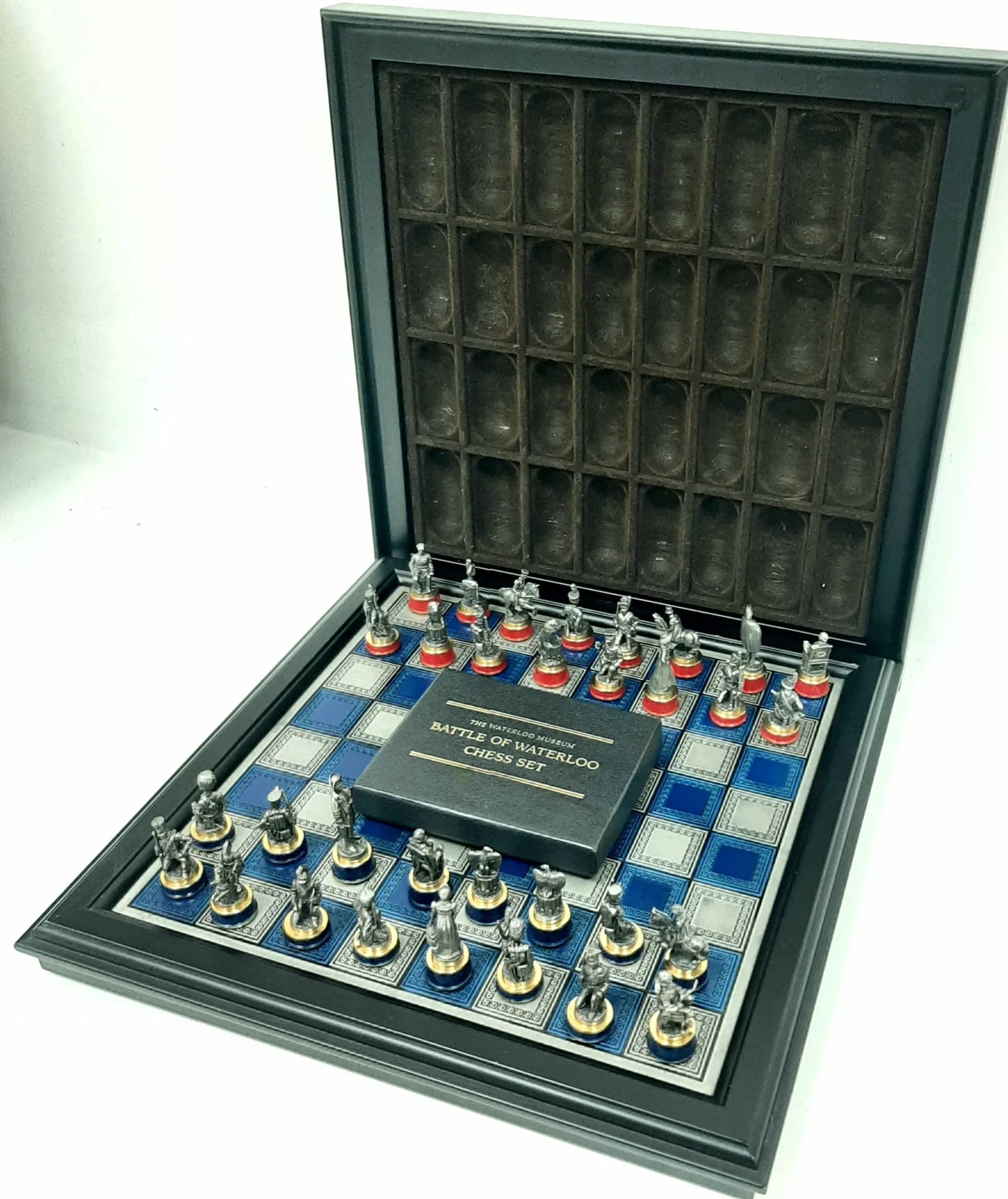 A Wonderful Collectible, Franklin Mint Waterloo Design Pewter Chess Set. The Set is comprised within it’s on wooden box and board. Complete with its Certificate of Authenticity and card details on each individual character chess piece.