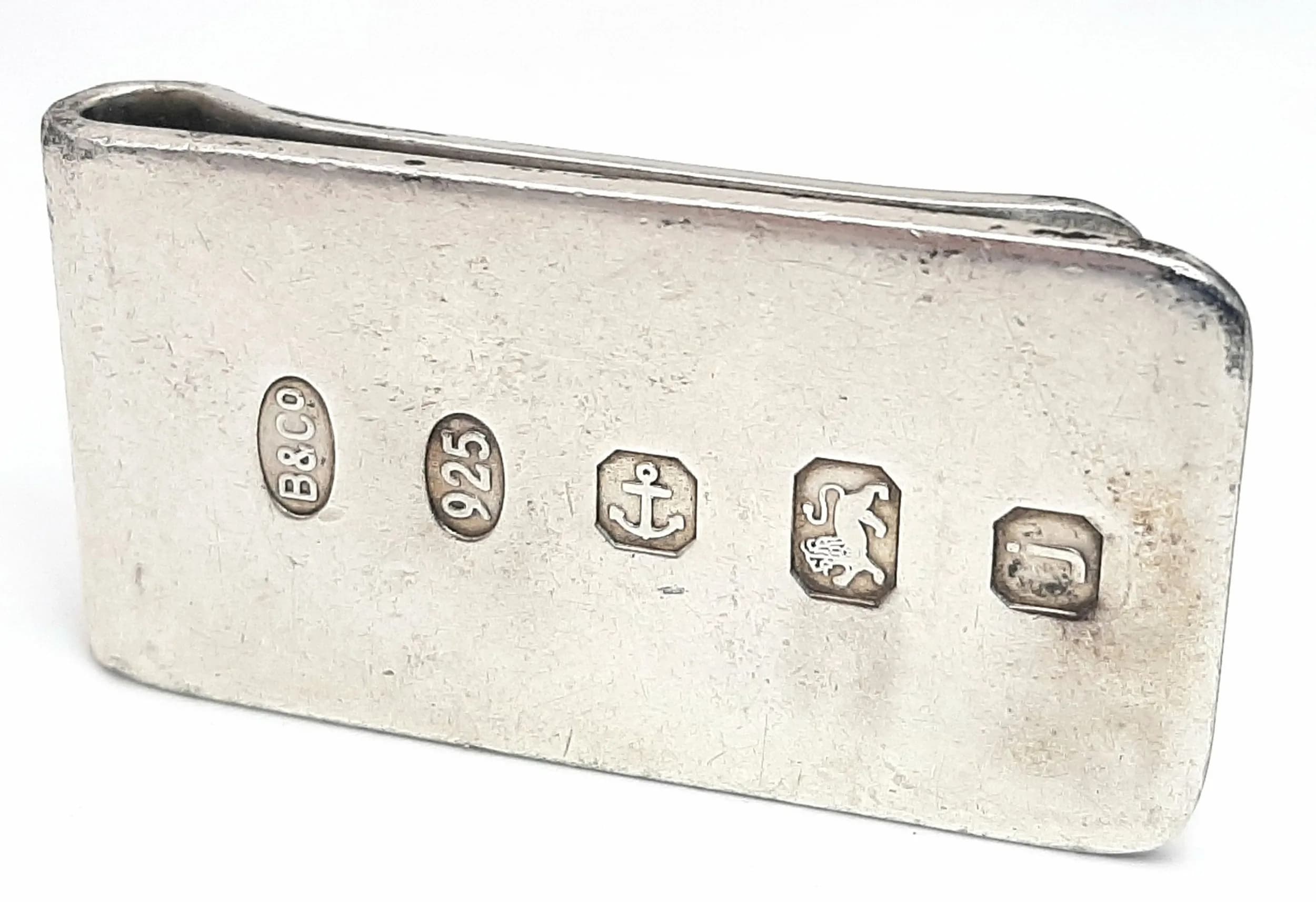 A Chunky Sterling Silver Money Clip. Full UK hallmarks for Birmingham 2008. 5cm. 52.4g.