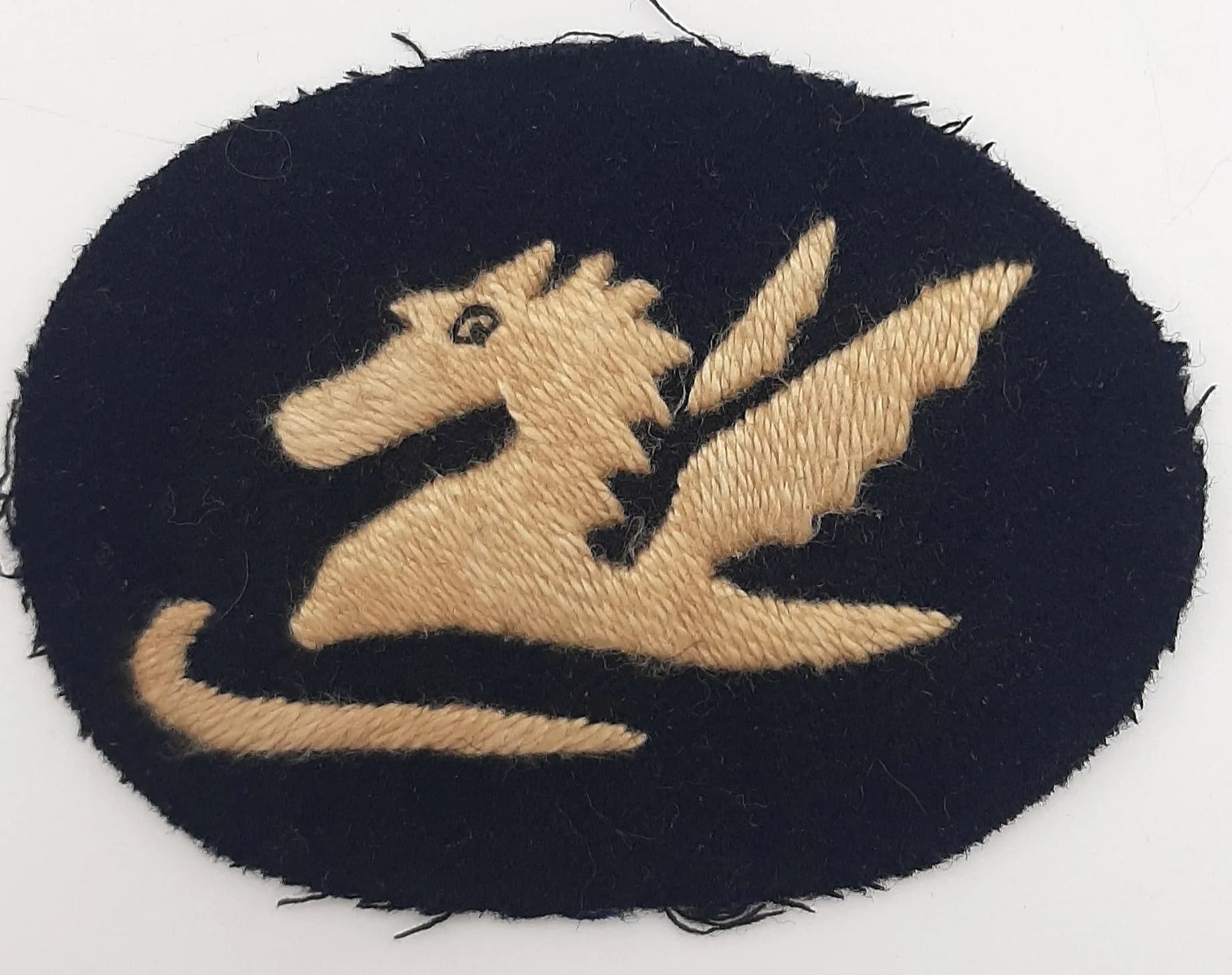 A Rare, WW2 Era Land Forces Adriatic Cloth Pegasus Badge. Oval shape. 7.5 x 5.5cm.