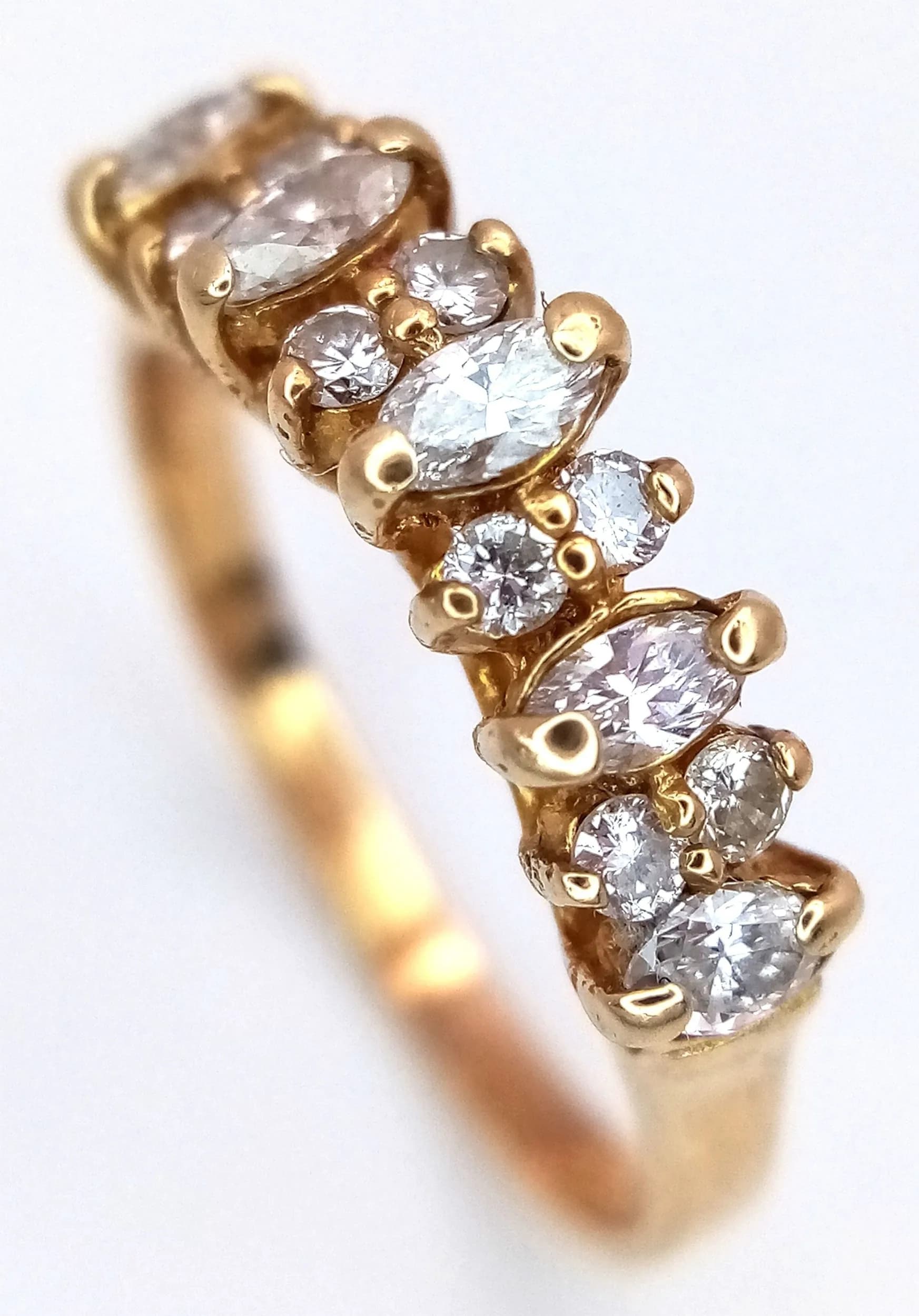 A 14K YELLOW GOLD, MIXED CUT, DIAMOND SET RING. 0.60CTW. 2.2G, SIZE L/M. SC 7036