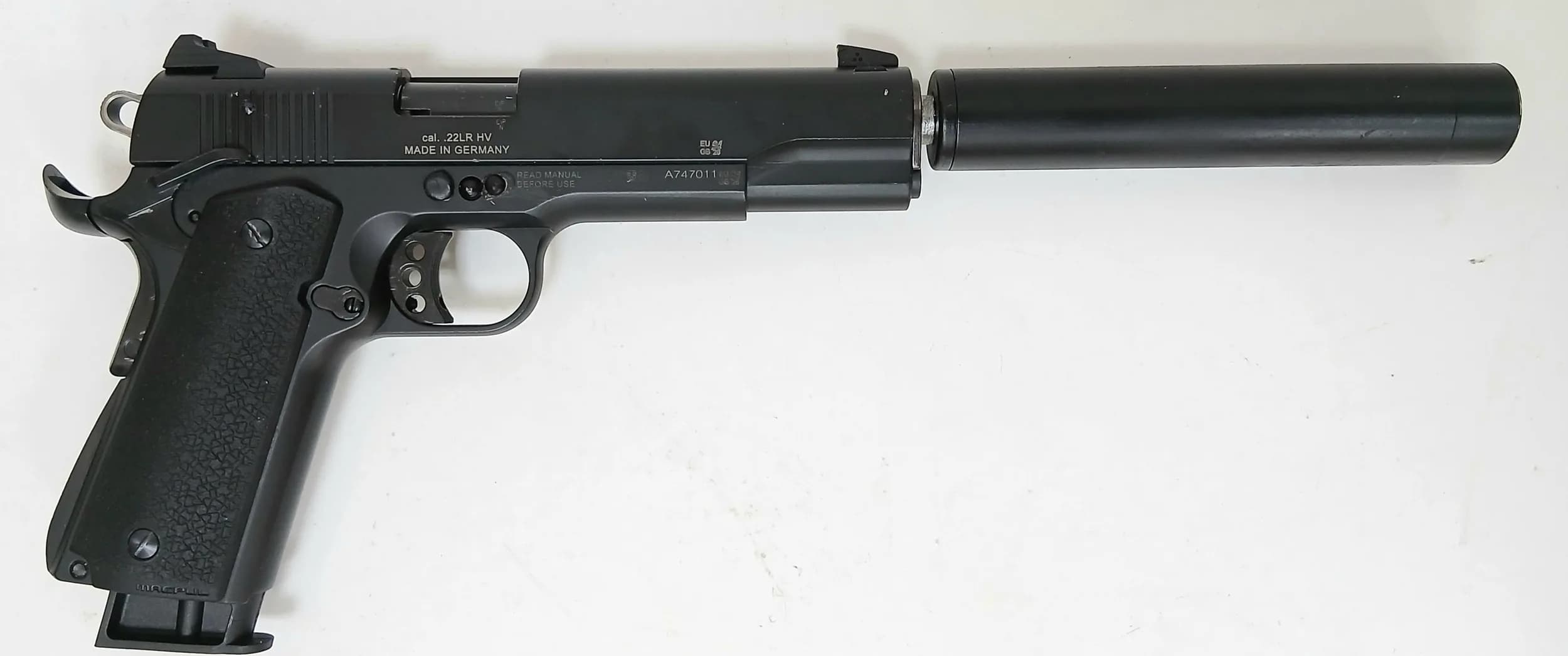 A Deactivated German Model GSG 1911 Semi-Automatic Pistol with Silencer. Calibre .22. Retractable magazine and detachable silencer. Comes with an EU deactivation certificate. UK/EU sales only - Not Holland. UK Mainland shipping only or arrange a courier.
