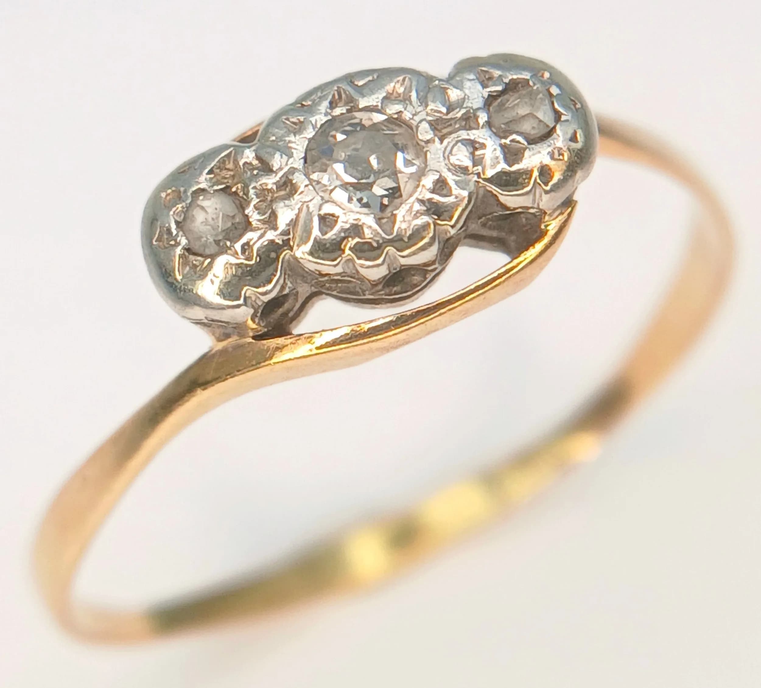 An Antique 18K Gold (tests as) Three Stone Diamond Ring. Size P. 1.5g.