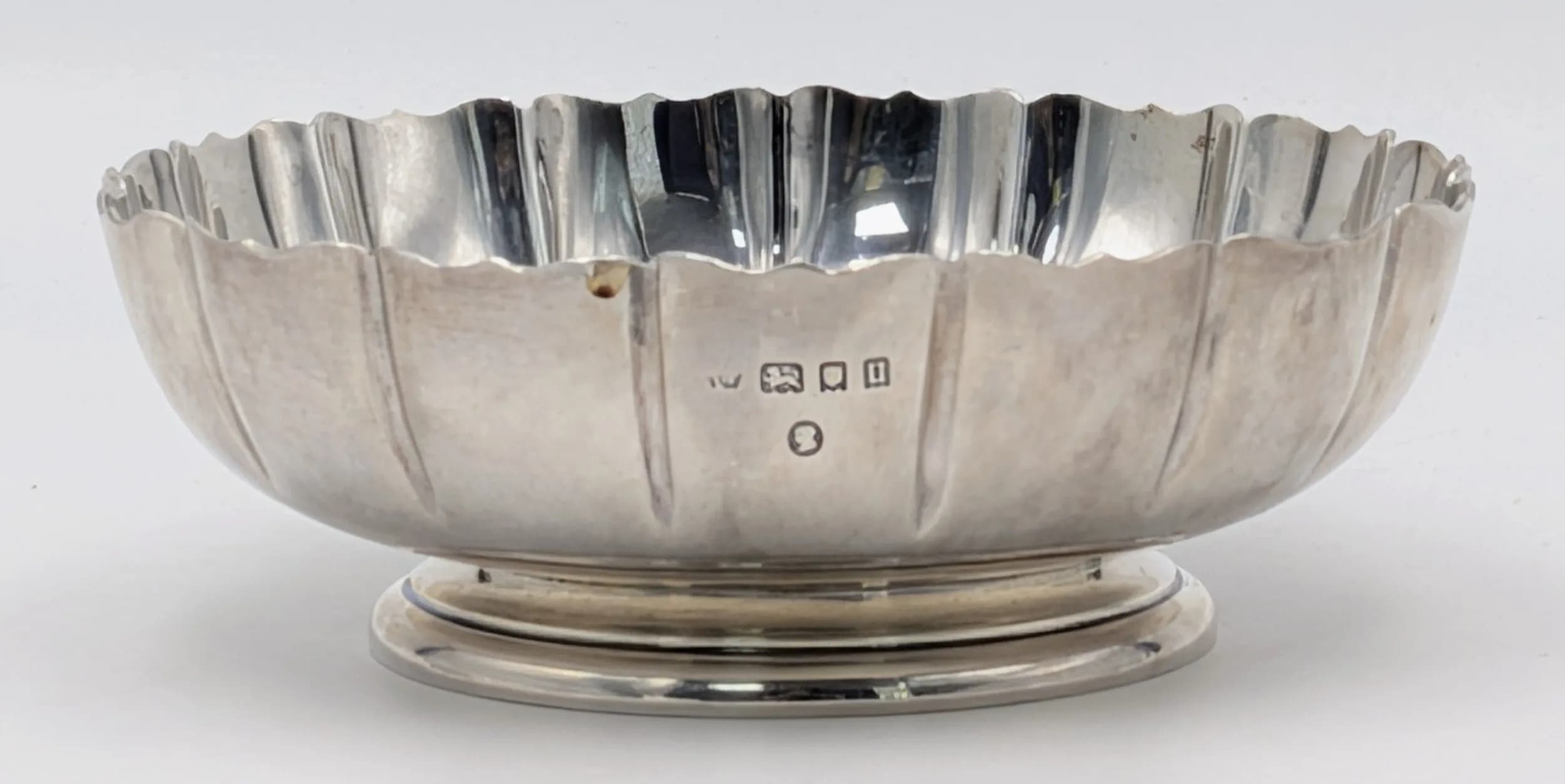 A Vintage Sterling Silver Trophy Bowl. Scalloped edges. 13cm diameter. 5cm tall. 201g.