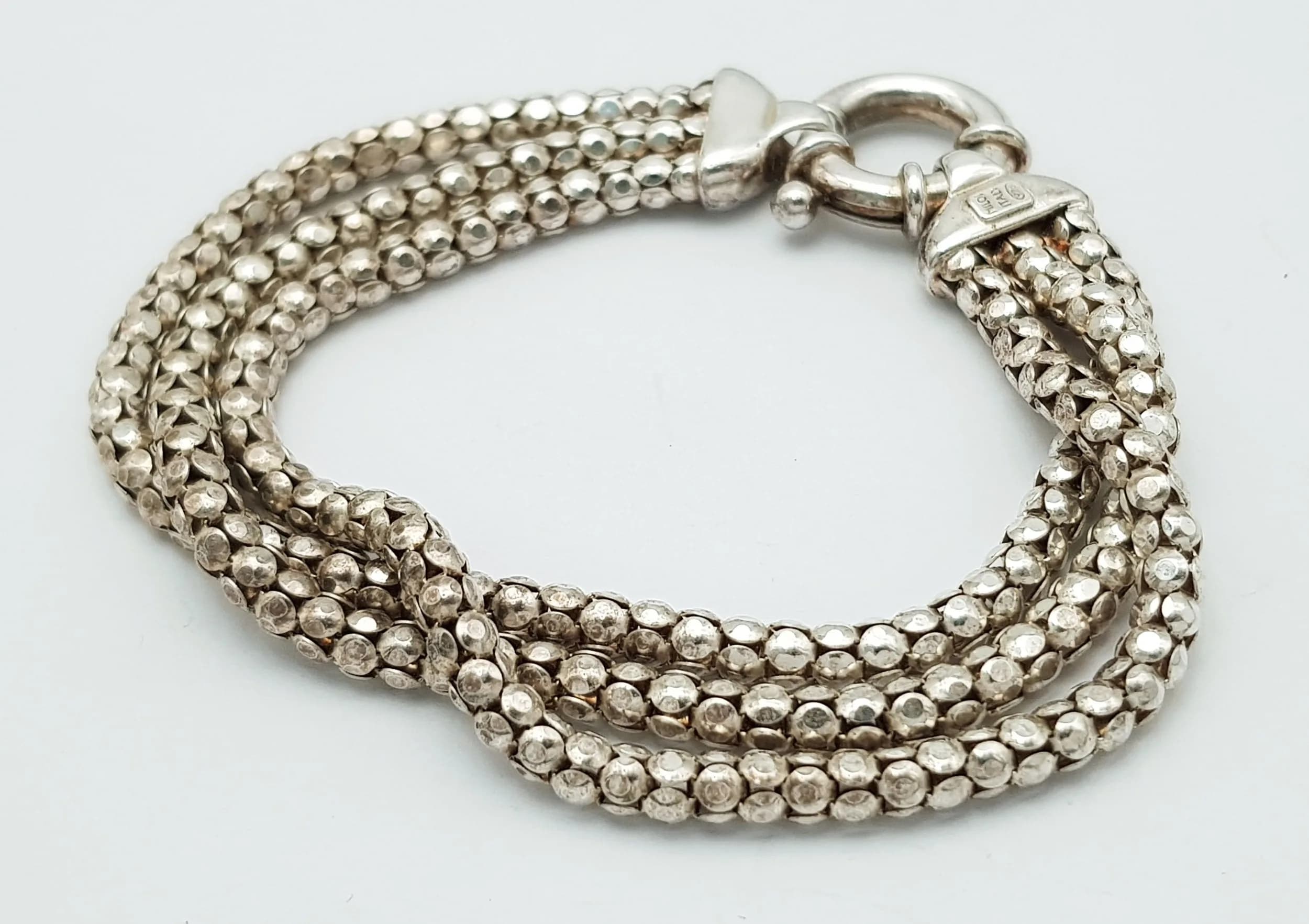 Fabulous ITALIAN SILVER BRACELET. TRIPLE FANCY ROPE with CHUNKY SILVER CLASP. Fully hallmarked. Beautiful piece , please see pictures. Approx 18.9 cm.