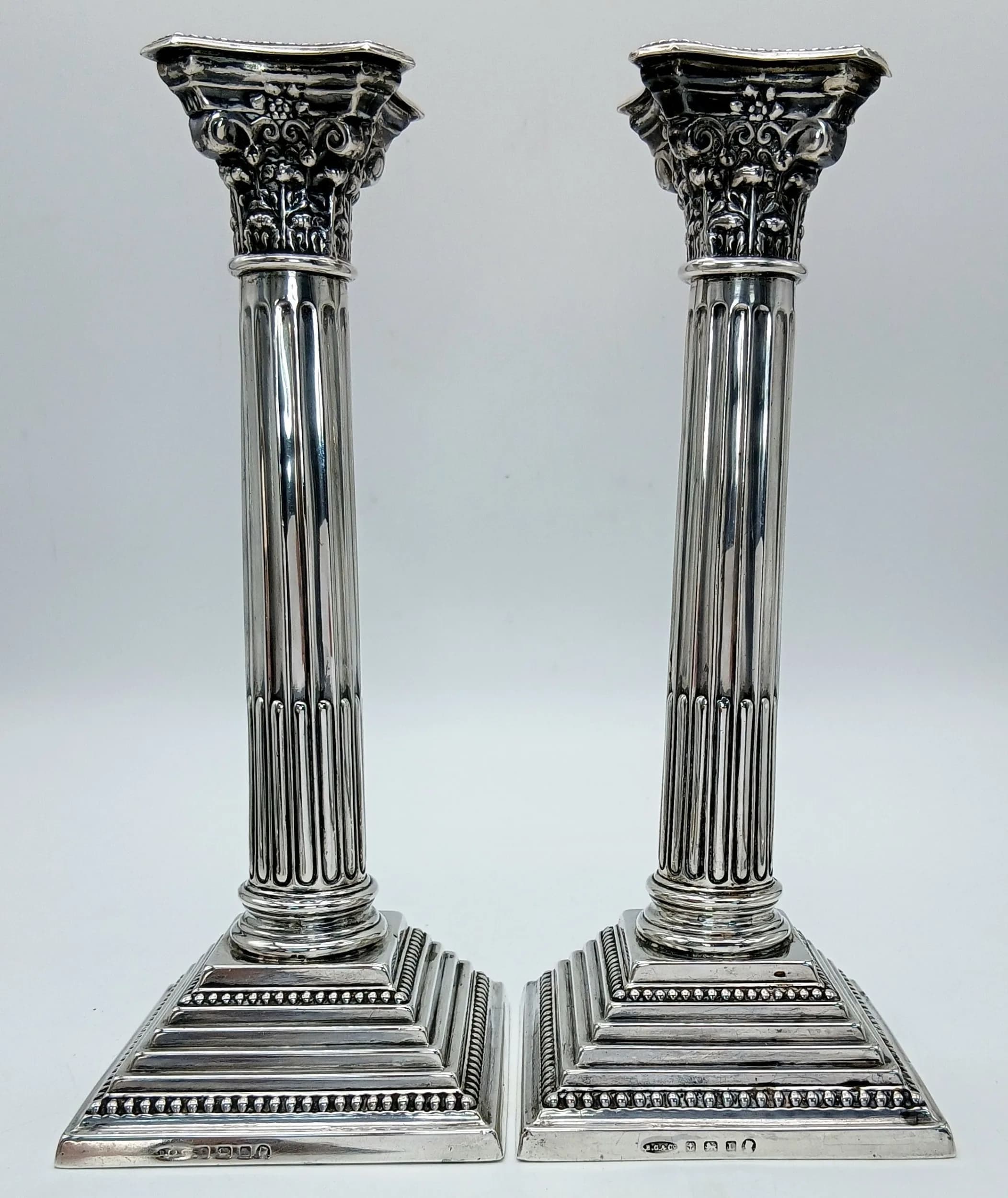 A Pair of Vintage SOLID 925 SILVER 1935 Corinthian Column Candlesticks. Fluted shaft and stepped beaded base. Birmingham hallmarks. 25cm height. 594g total weight.